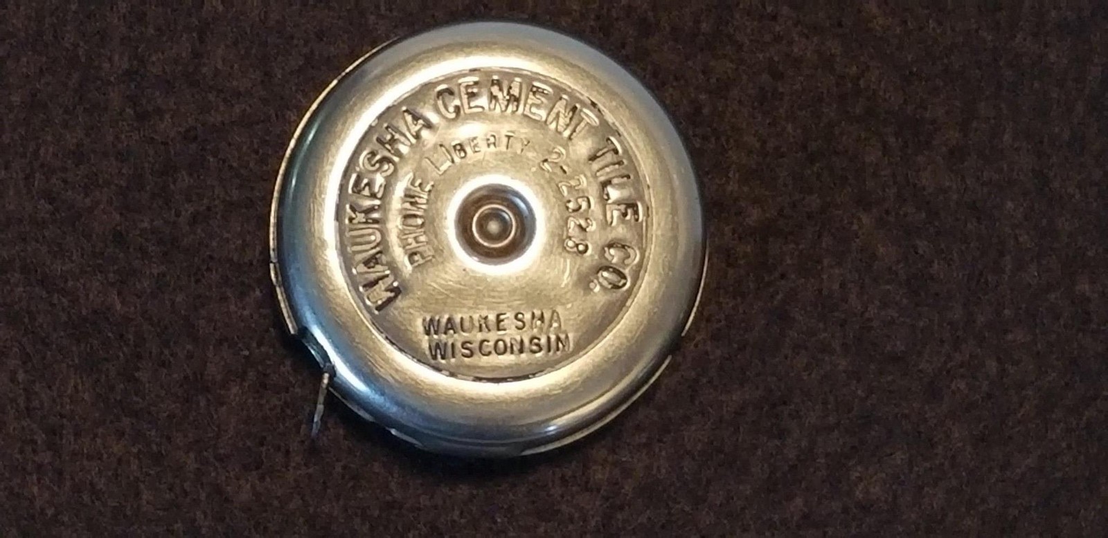 Vintage 1930s Lufkin Round Waukesha Cement And Tile Co. 6ft Tape Measure