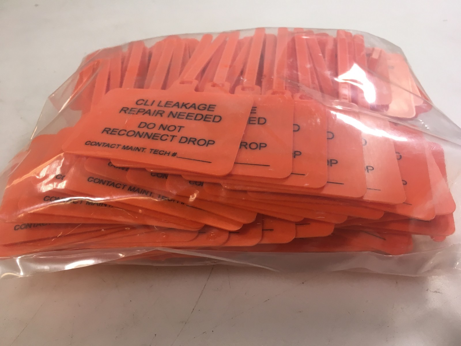 "CLI Leakage Repair Needed" Security Lock out Tags bag of 100