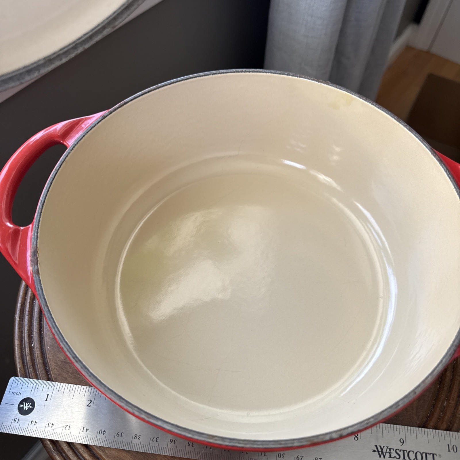 Le Creuset Signature Enameled Cast Iron Dutch Oven in the red 'Cerise' color