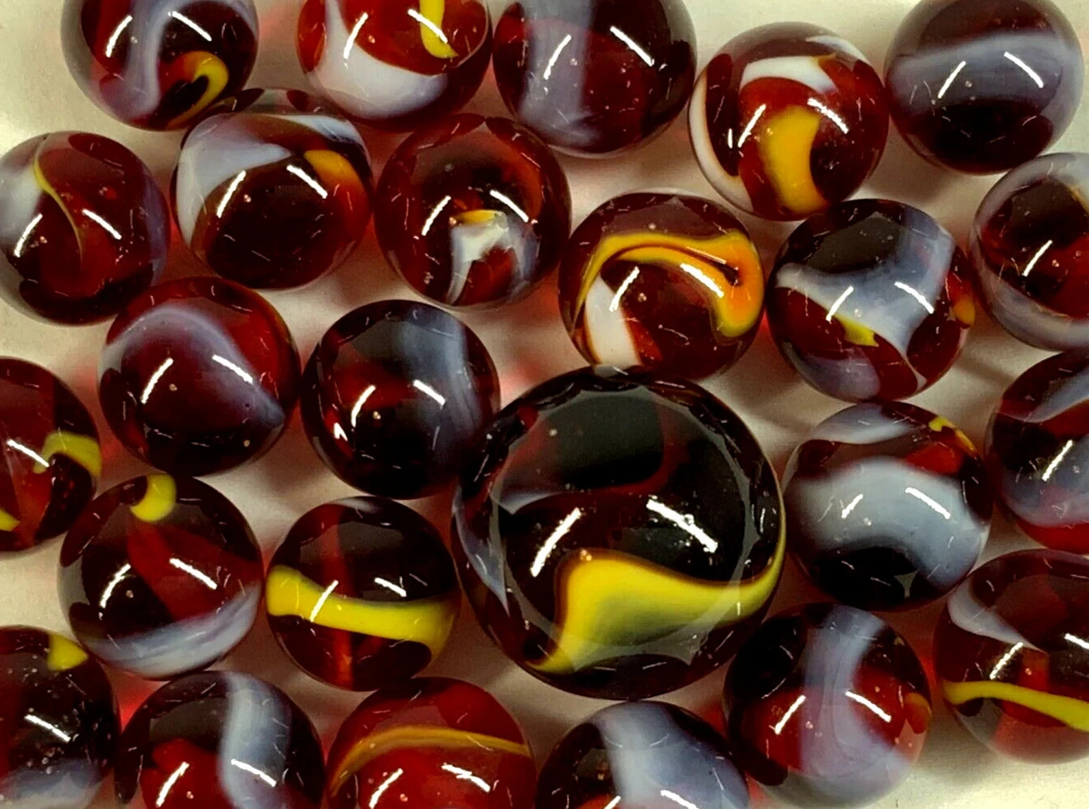 25 Glass Marbles FIRE Translucent Clear Red White/Yellow Swirl Pack Shooter