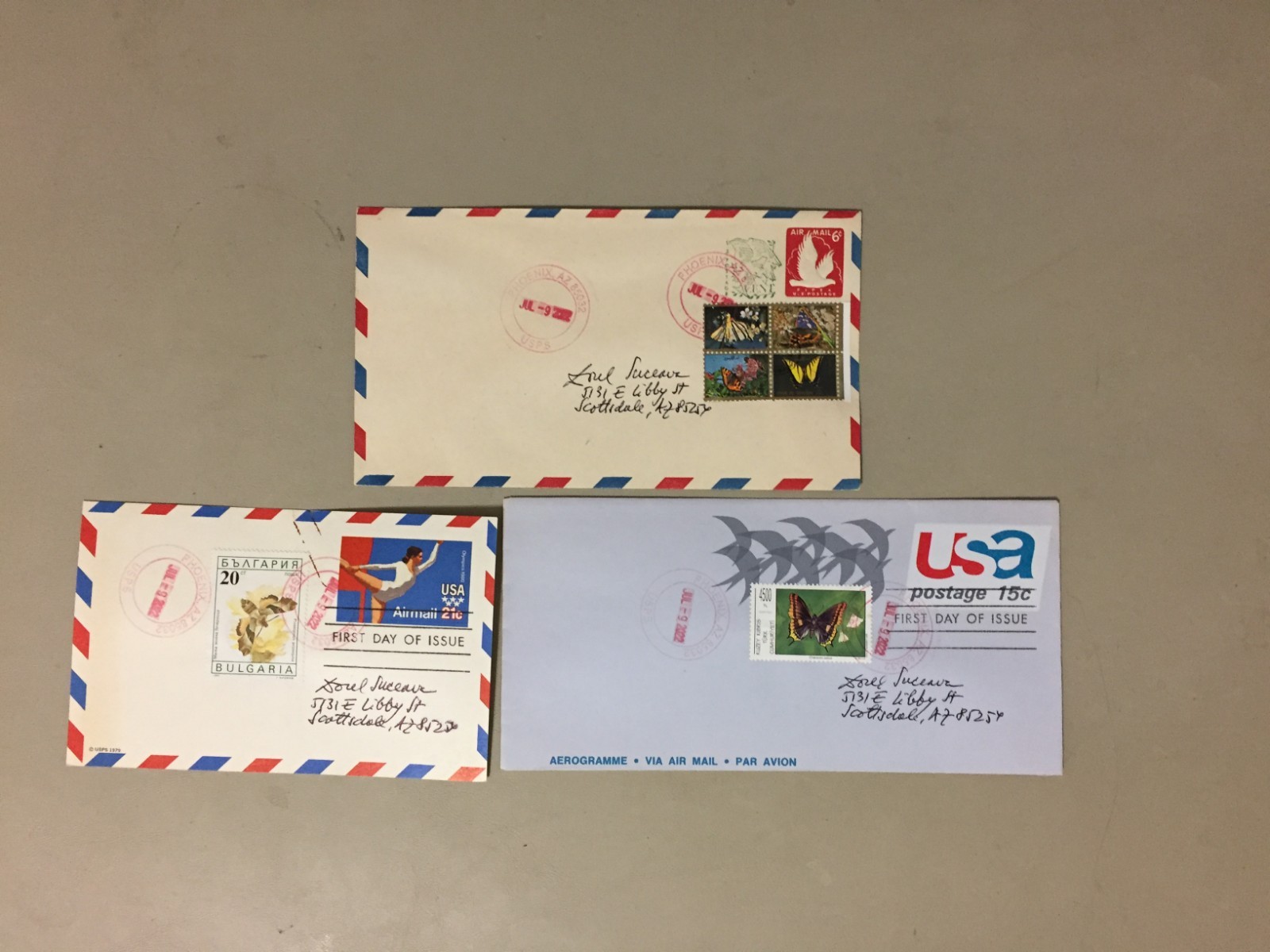 Three postal stationery with additional BUTTERFLY stamps