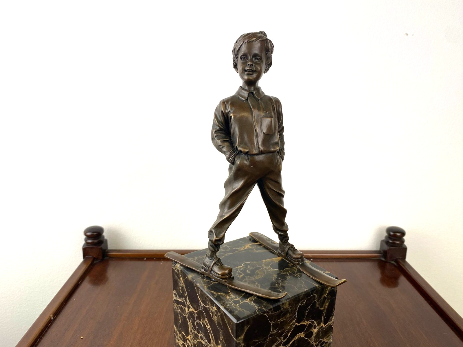 Bronze sculpture boy with ski on marble base after Ferdinand Preiss