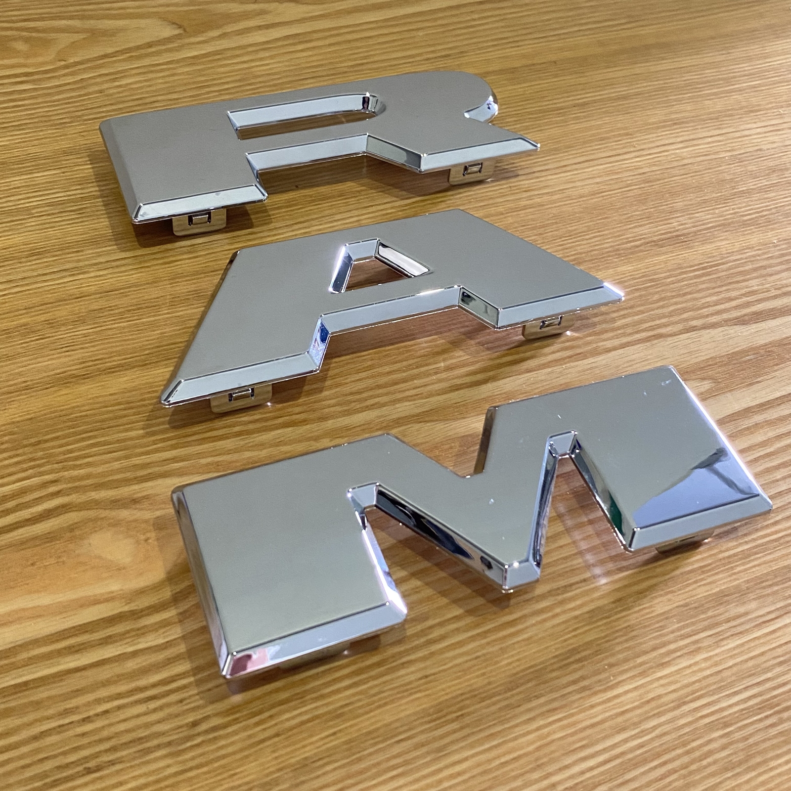 Front Grilles Emblem Letter For 2019-2023 RAM 1500 Grill Badge Chrome 68311411AA