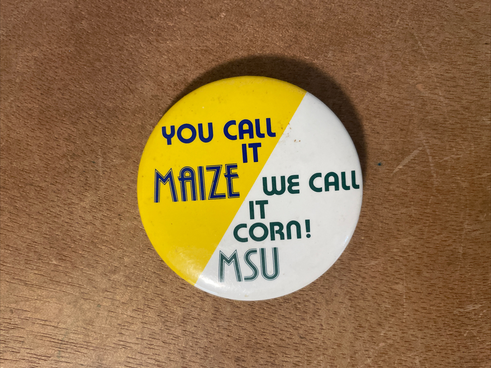 UM-MSU Rivalry You Call It Maize We Call It Corn Pinback Button 2”