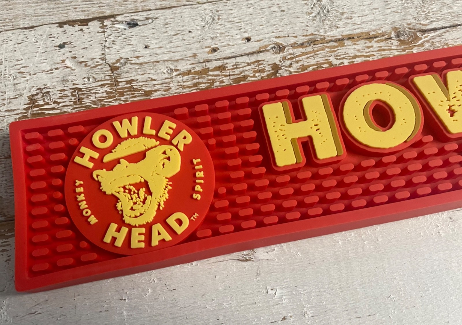 New Old Stock Howler Head Monkey Spirit Red Rubber Bar Tap Mat