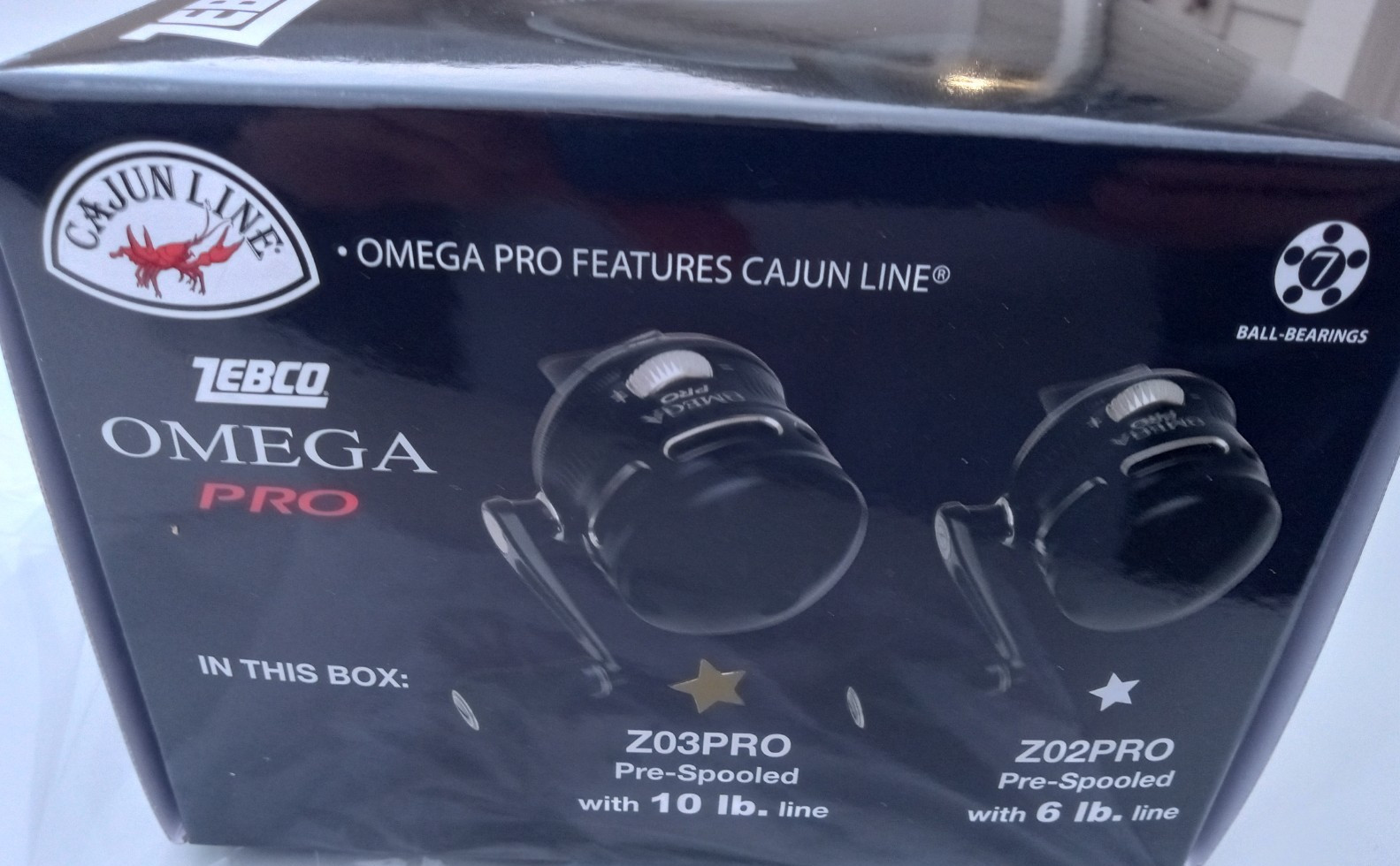 new in box ZEBCO OMEGA PRO 3 Z03PRO 3.4:1 W/10LB LINE 7 BEARING SPINCAST REEL
