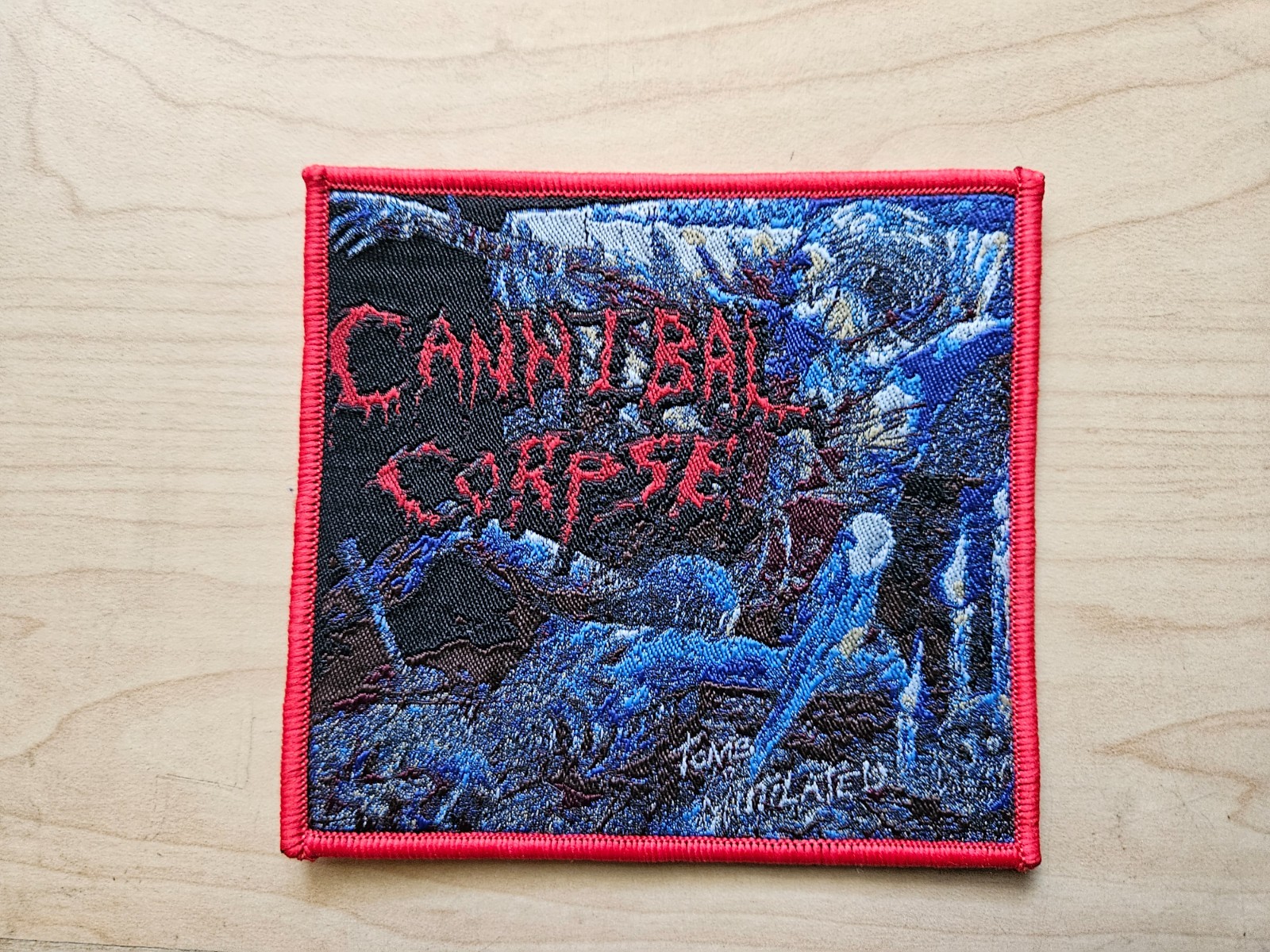 CANNIBAL CORPSE, TOMB OF THE MUTILATED, SEW ON RED BORDER WOVEN PATCH