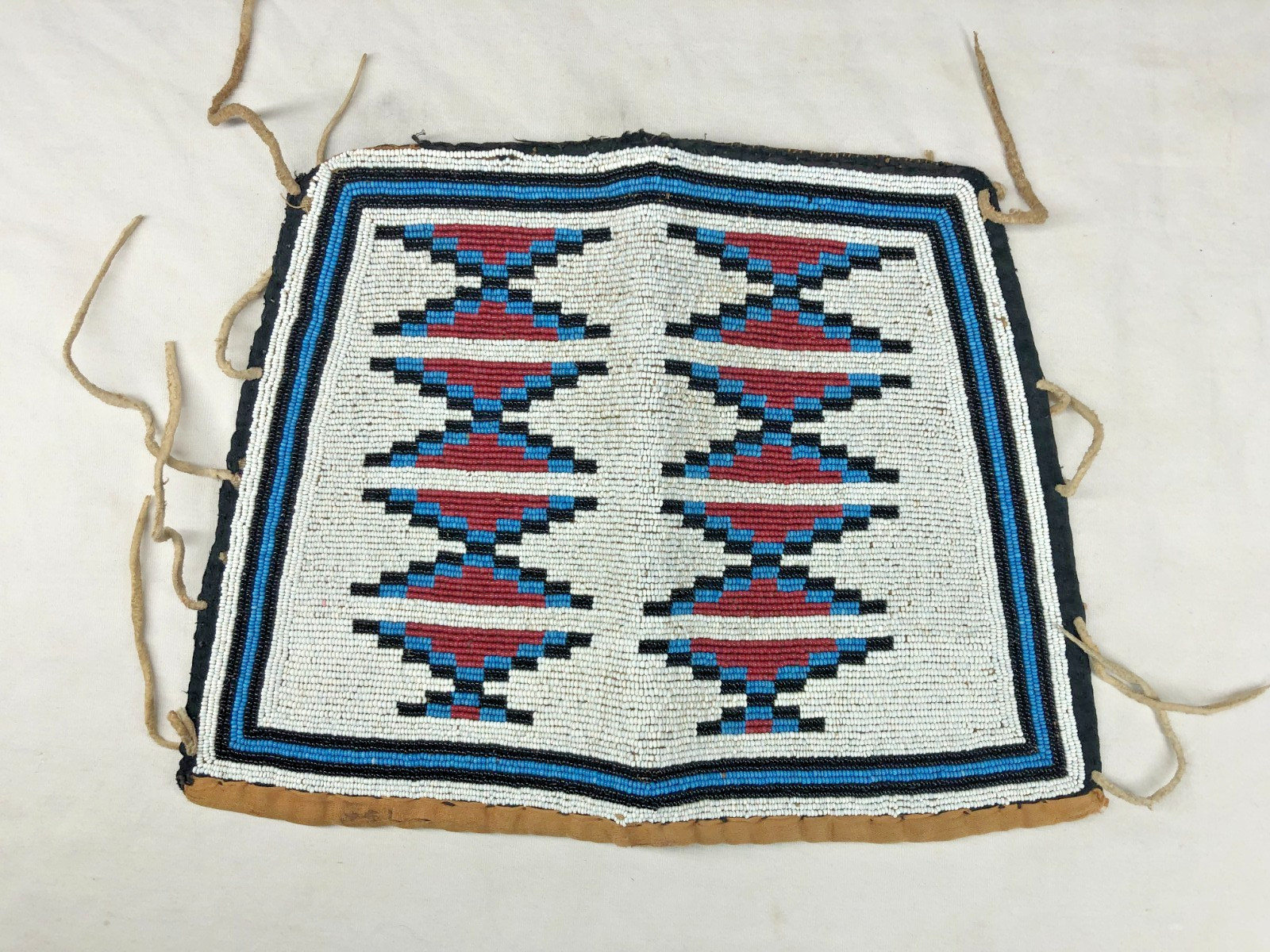 LATE 1800'S/EARLY 1900'S NATIVE AMERICAN MADE BEADED WRIST CUFFS W/ TRADE CLOTH