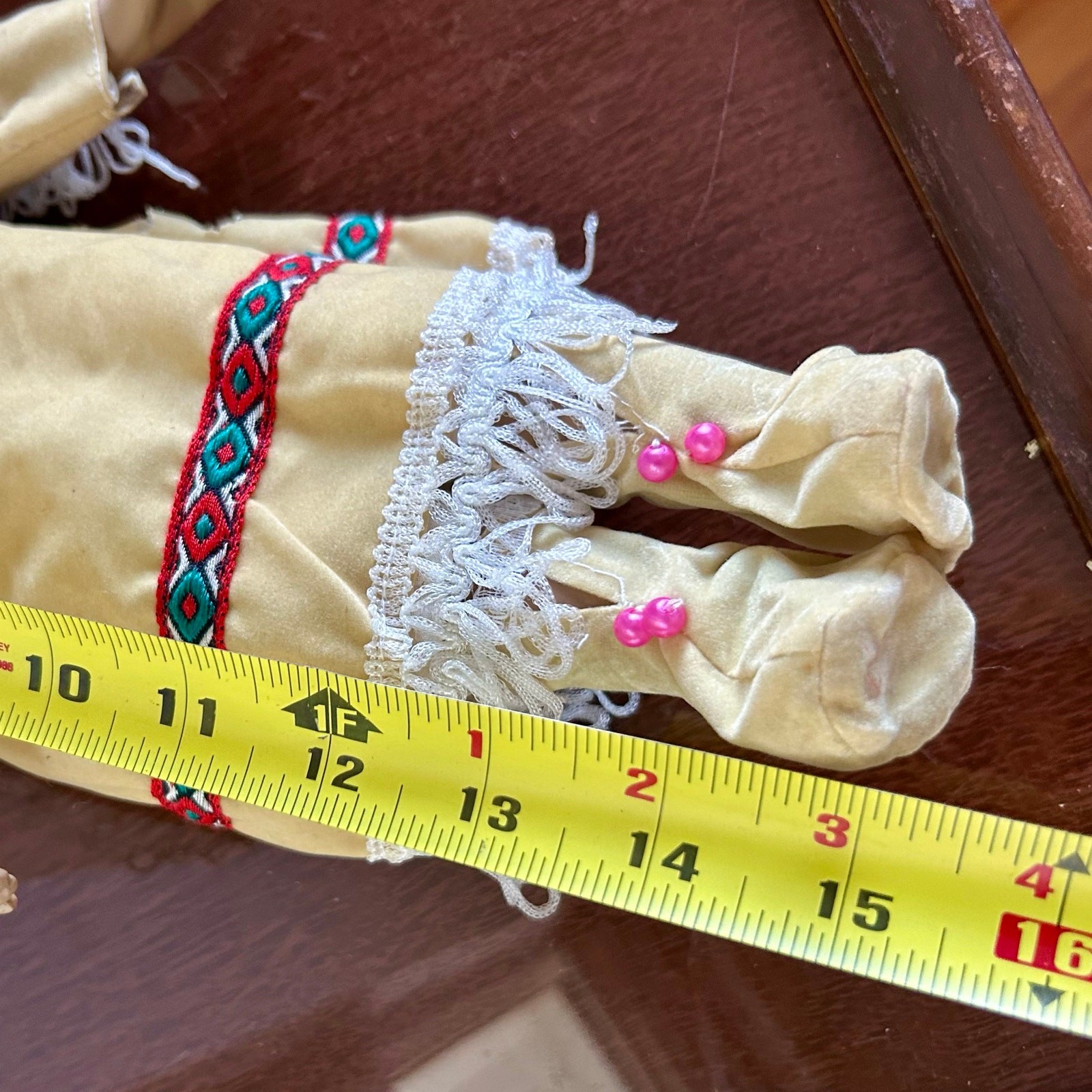 Vintage Porcelain Native American-Inspired Doll with Braids and Beaded Outfit