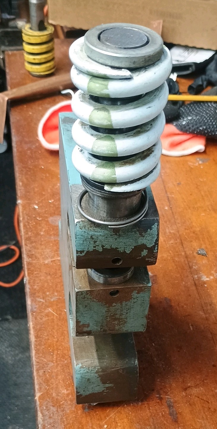 Unipunch style tool. 2 in wide. 12 in high. comes with 670 punch and 730 bottom