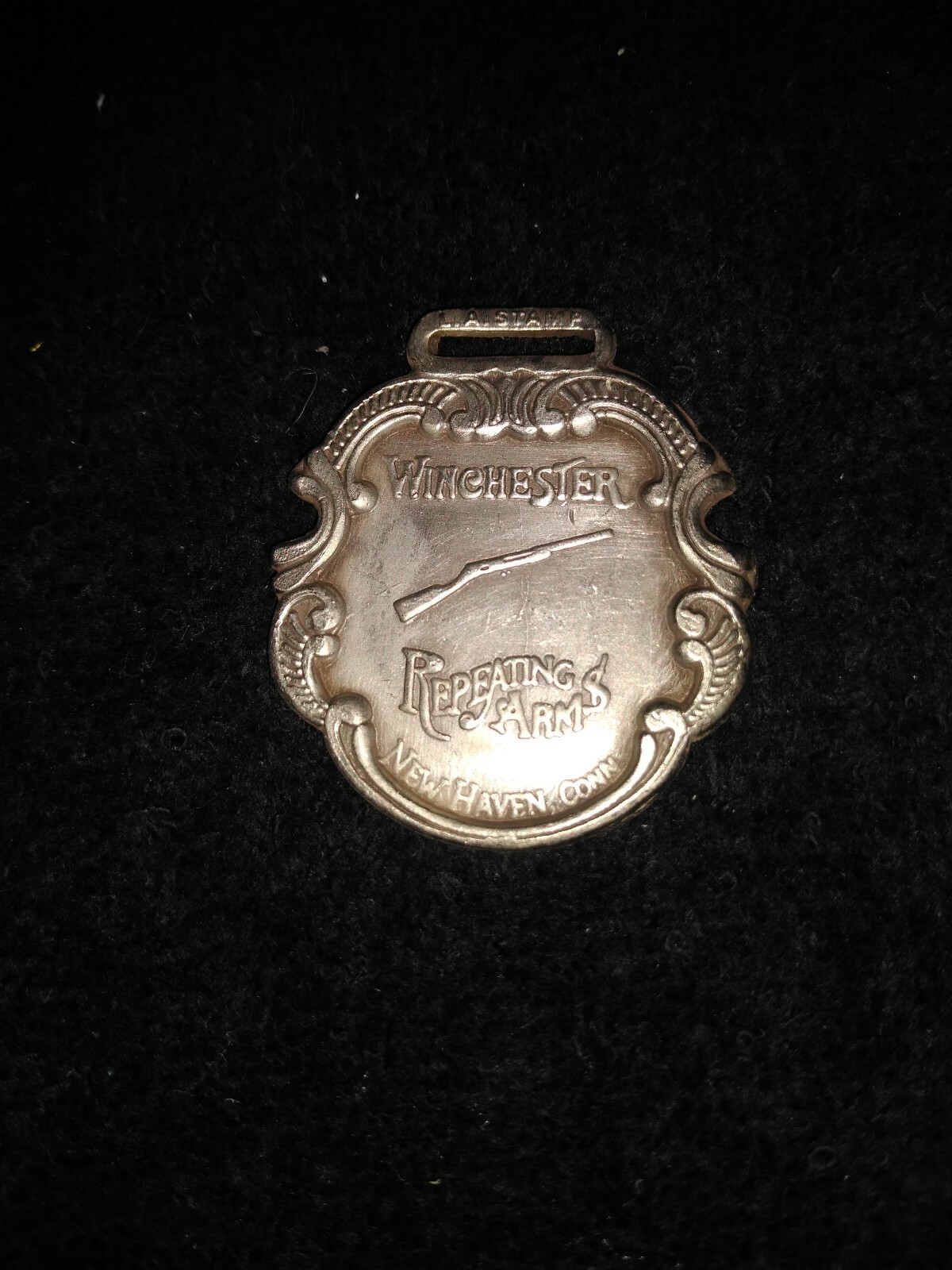 Winchester Repeating Arms Wàtch Fob 2 1/2 x 1 1/2 polished SS Very Nice