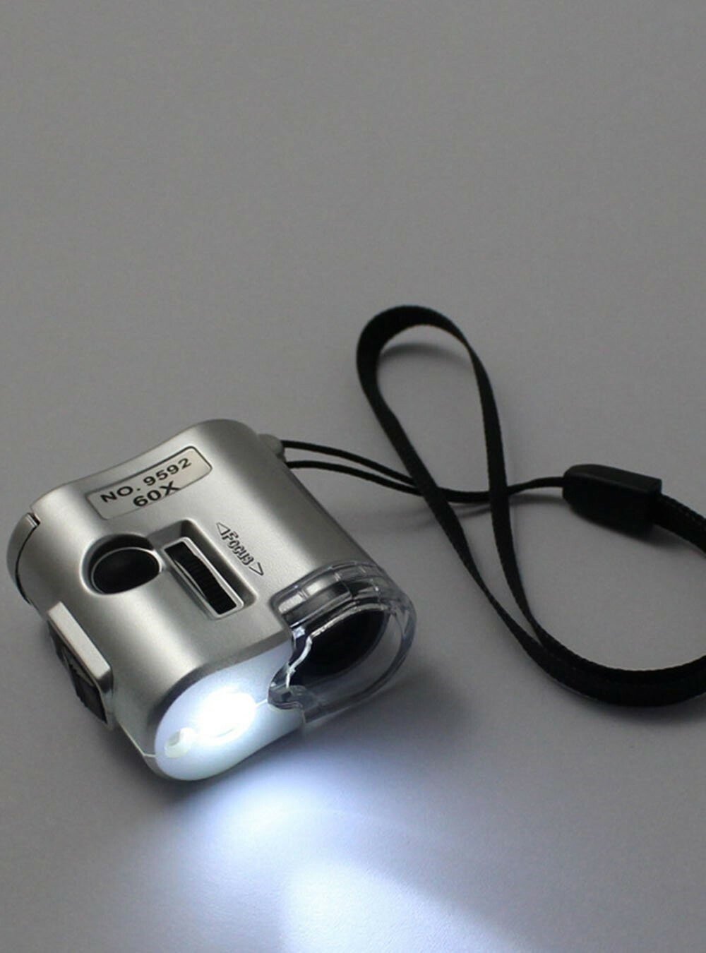 CKStamps: 60X Pocket Mini Magnifier Microscope Loop w/LED UV Light(Color:Silver