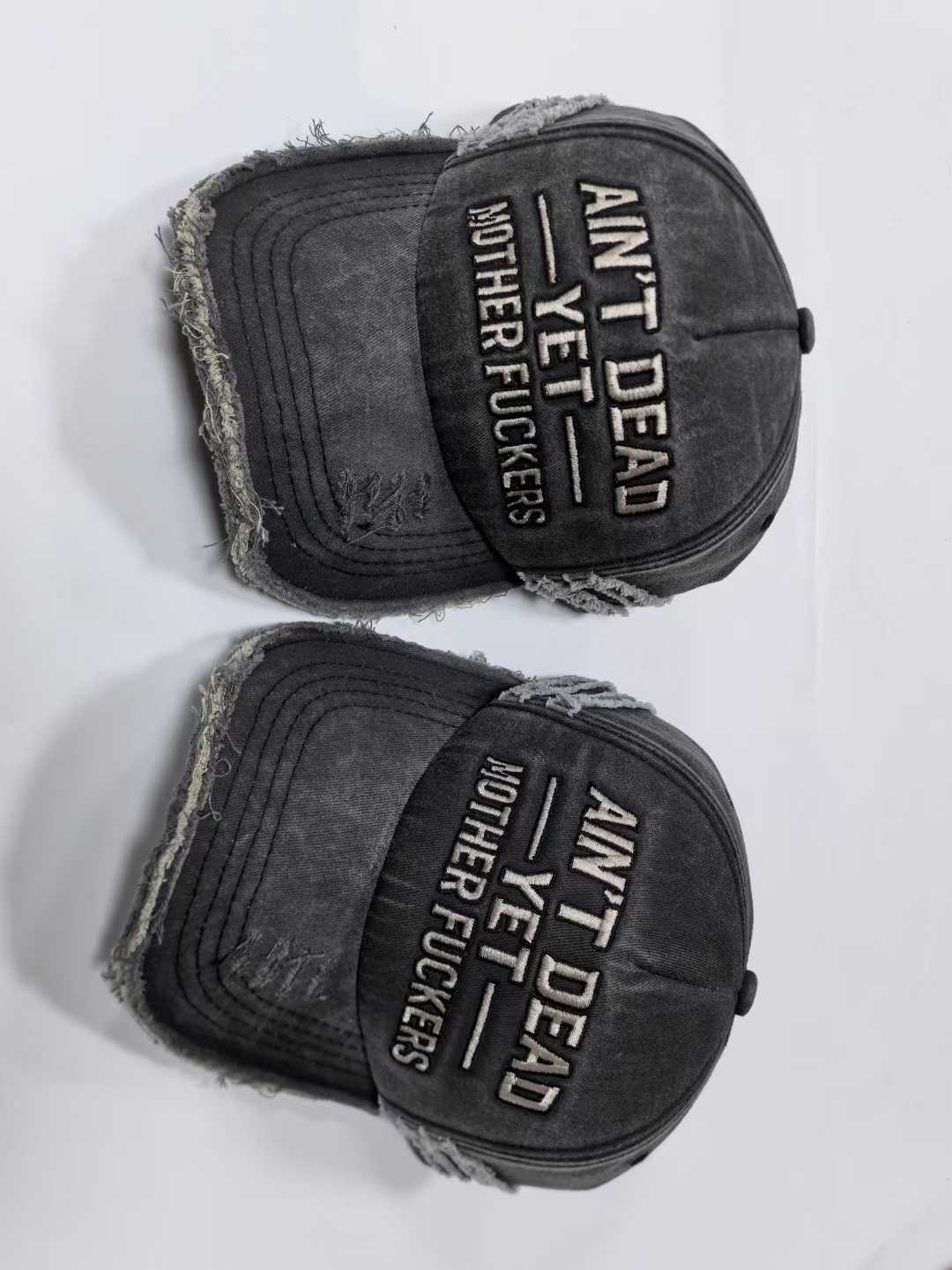 "Ain't Dead Yet" Distressed Washed Black Baseball Cap | Embroidered Dad Hat