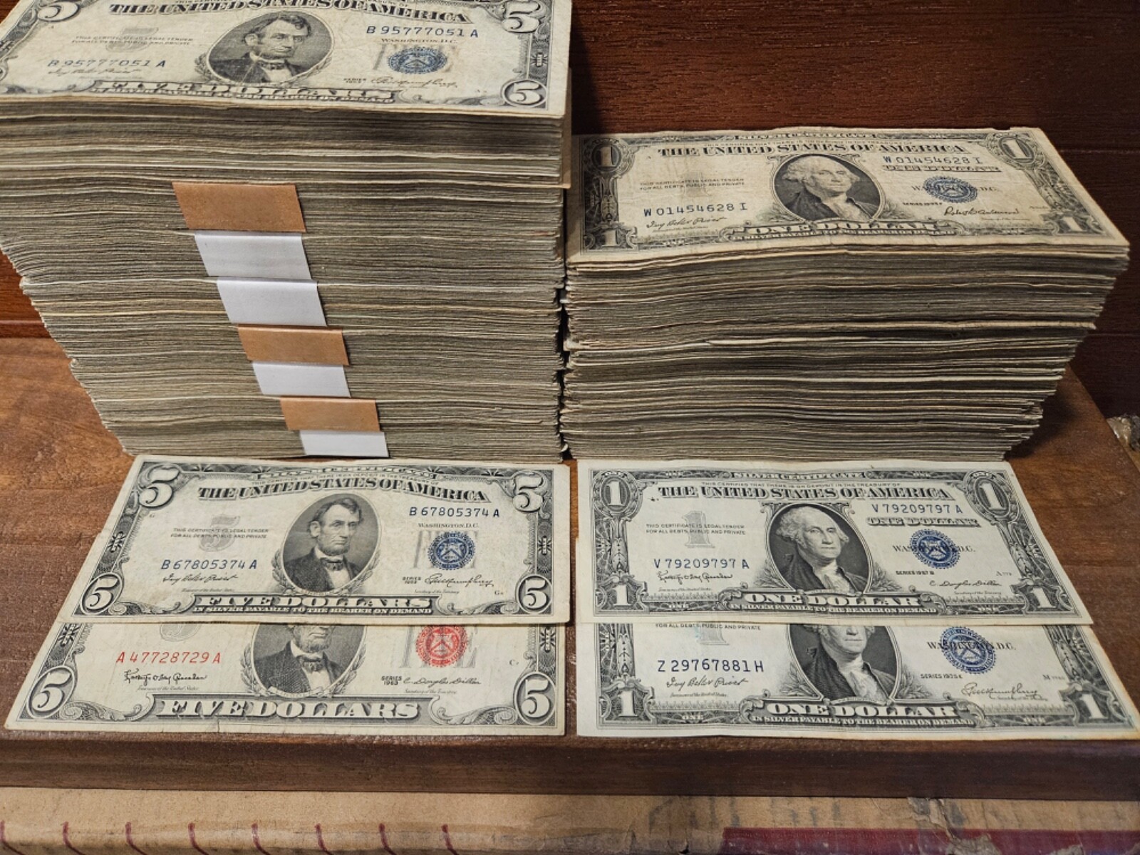 4 notes. 1953 Red Seal $5, $5 Silver cert, 1953 $1, 1935 $1 silver certificate