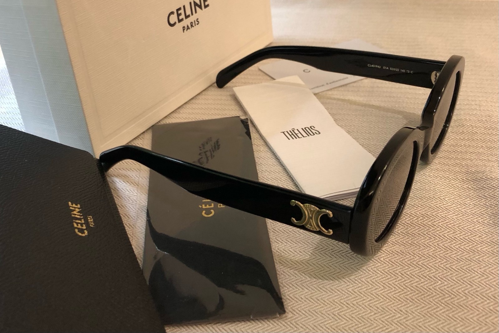Celine CL40194U Triomphe Oval Sunglasses Black Frame Dark Grey Lens Women