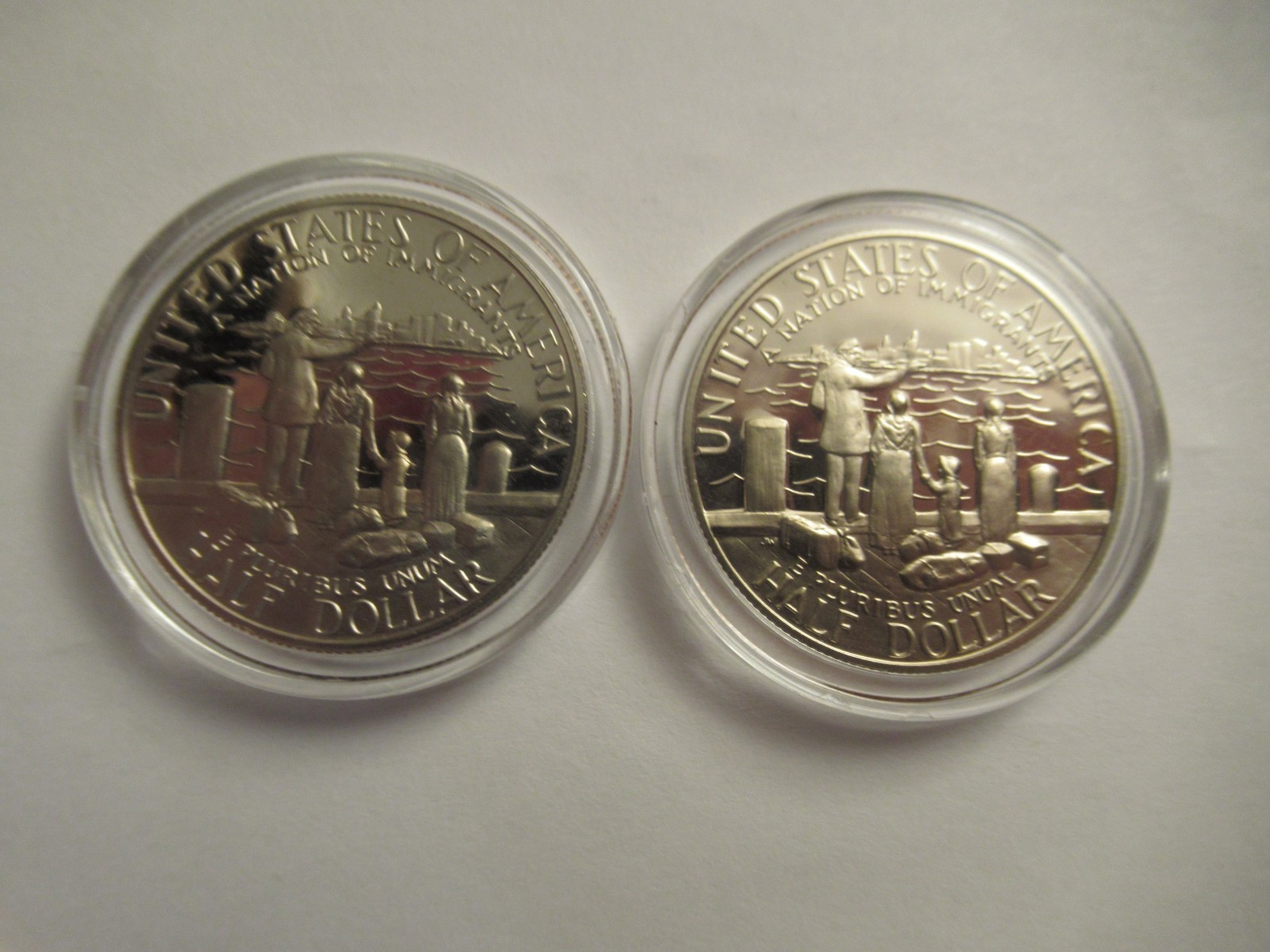 Lot of 11 US Clad half dollars, mix dates, w/ capsules