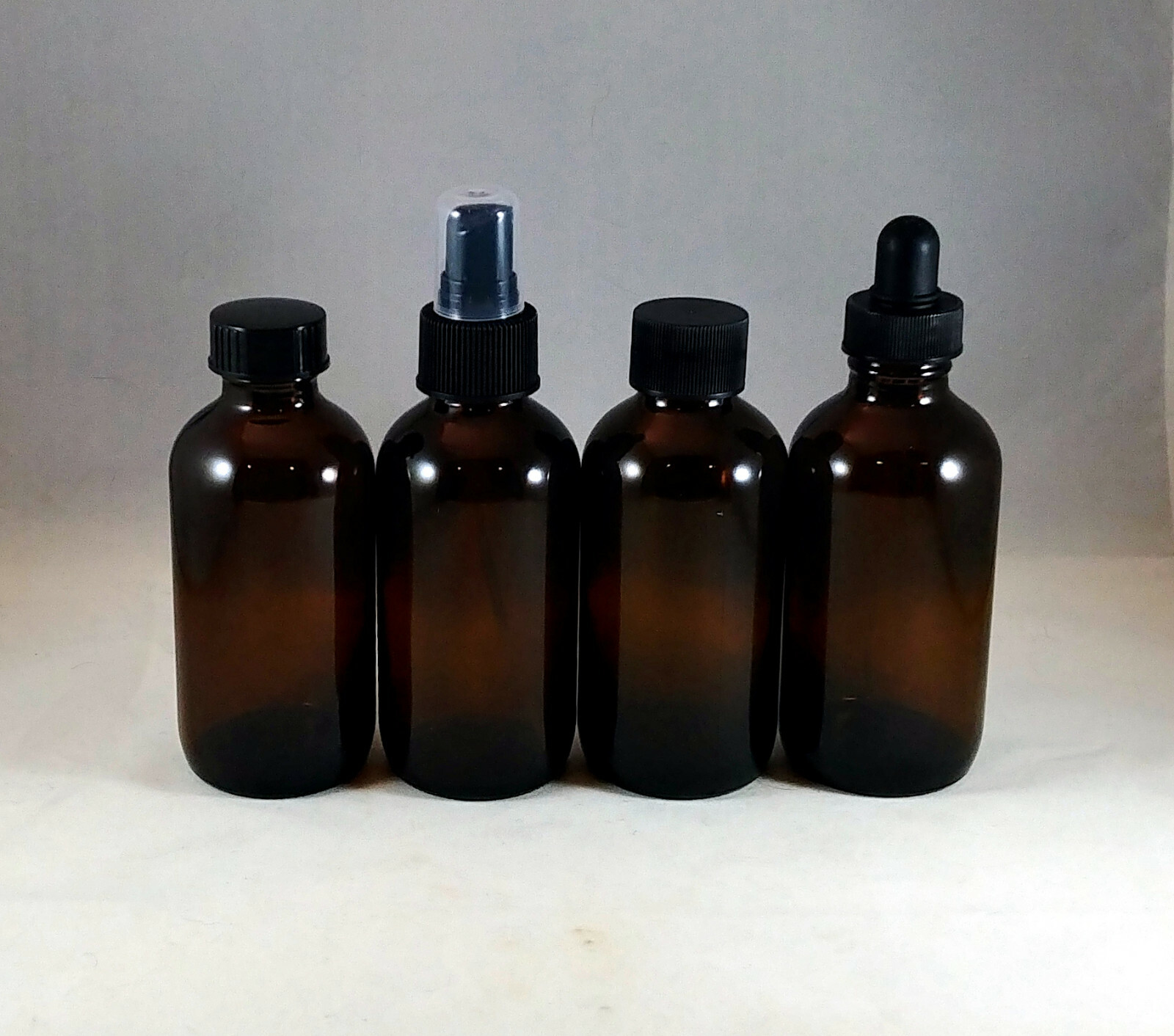 4 oz Amber Boston Round Glass Bottles w Caps, Droppers, Phenolic, Mult Lot Sizes