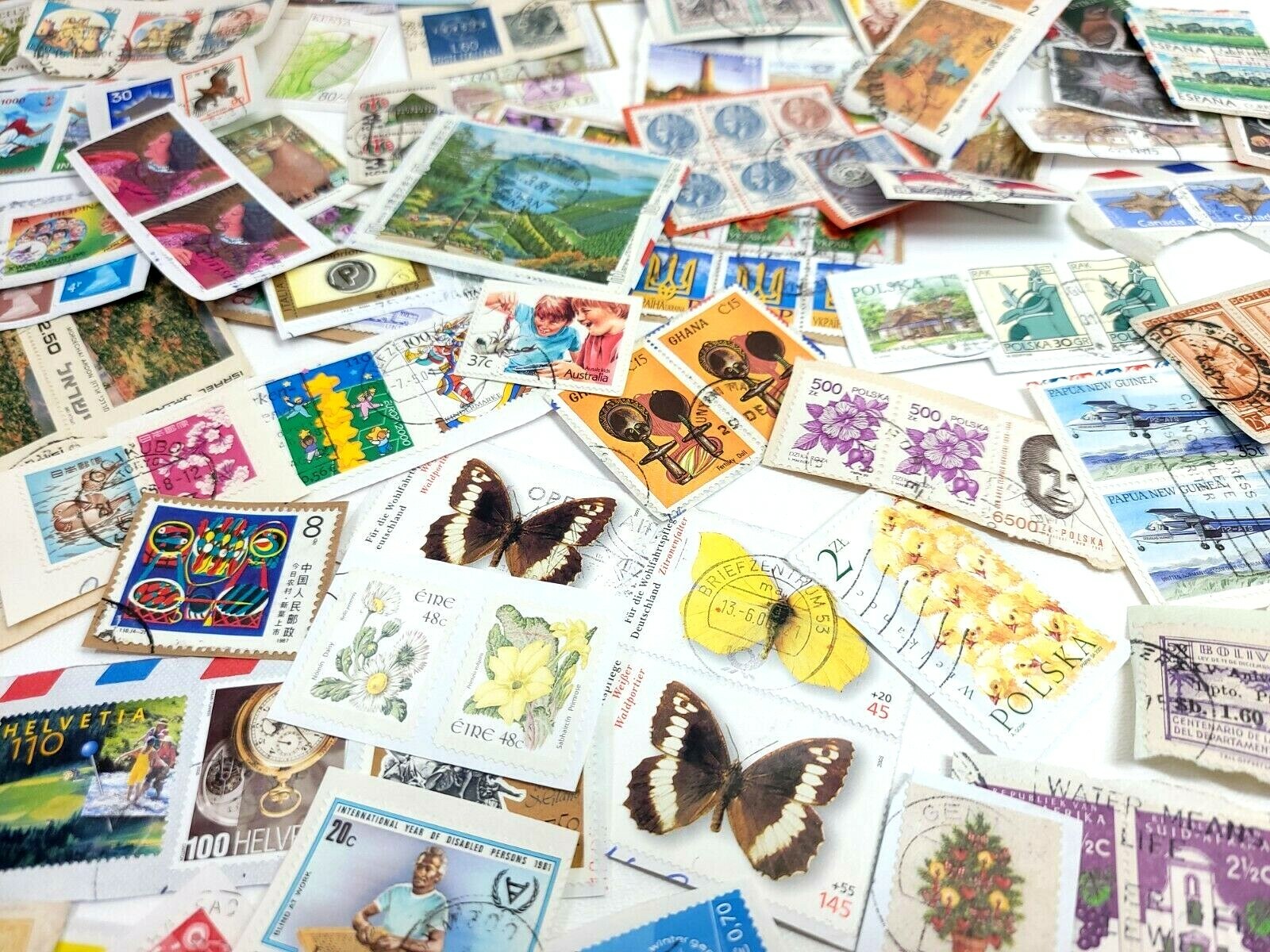 QUARTER POUND of FOREIGN Stamp KILOWARE Mix ON Paper