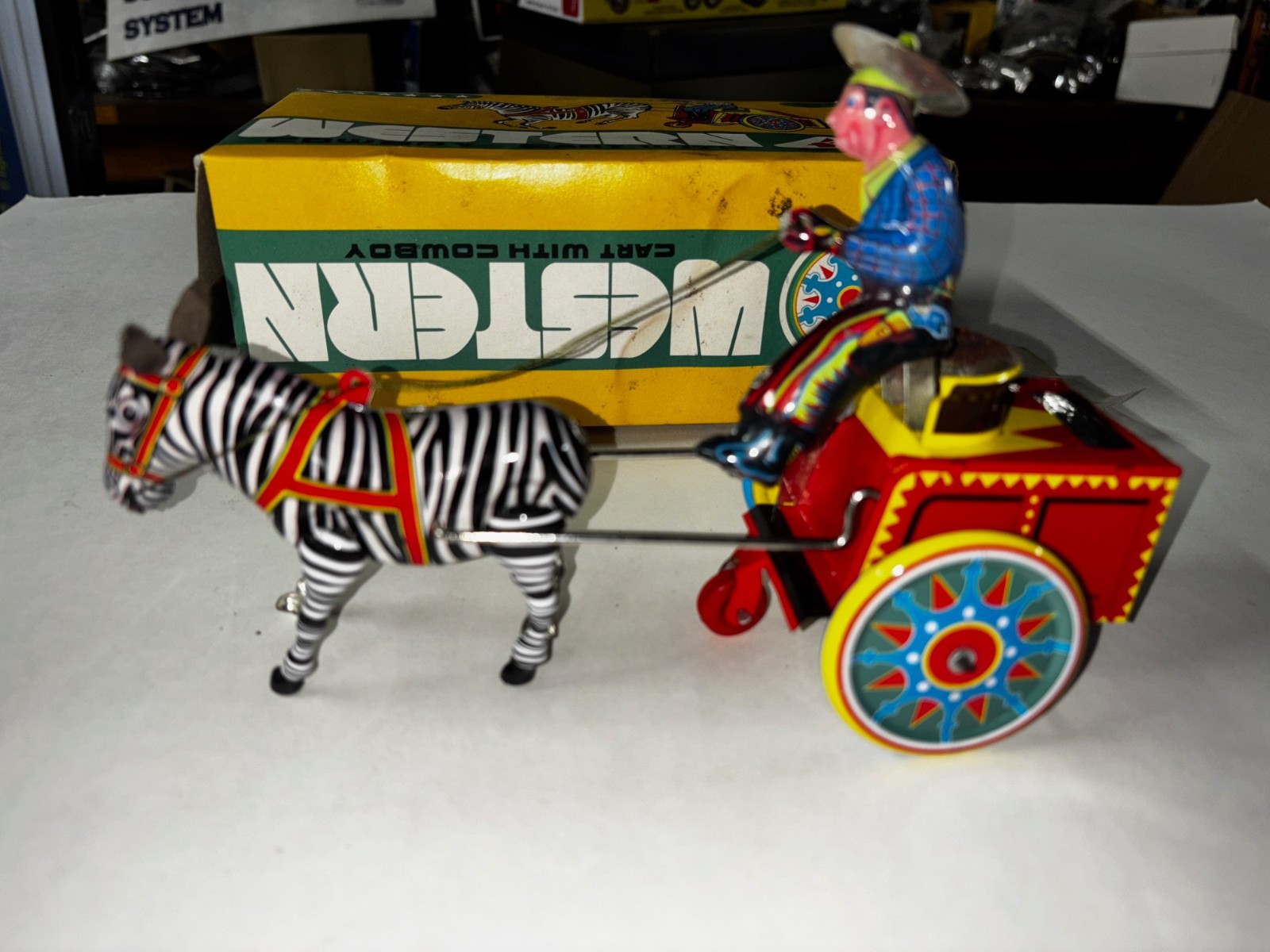 NOS New Vintage Tin Litho Wind-Up Toy Western Cowboy on Cart. MINT IN BOX w/key