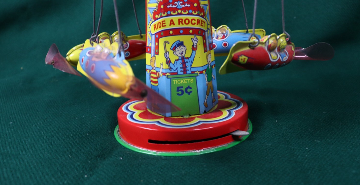 Schylling Reproduction Tin Type Rotating Ride A Rocket Toy 2000 Classic - works
