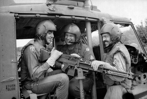 Vietnam  War  Photos --   UH-1 Huey + Door Gunner