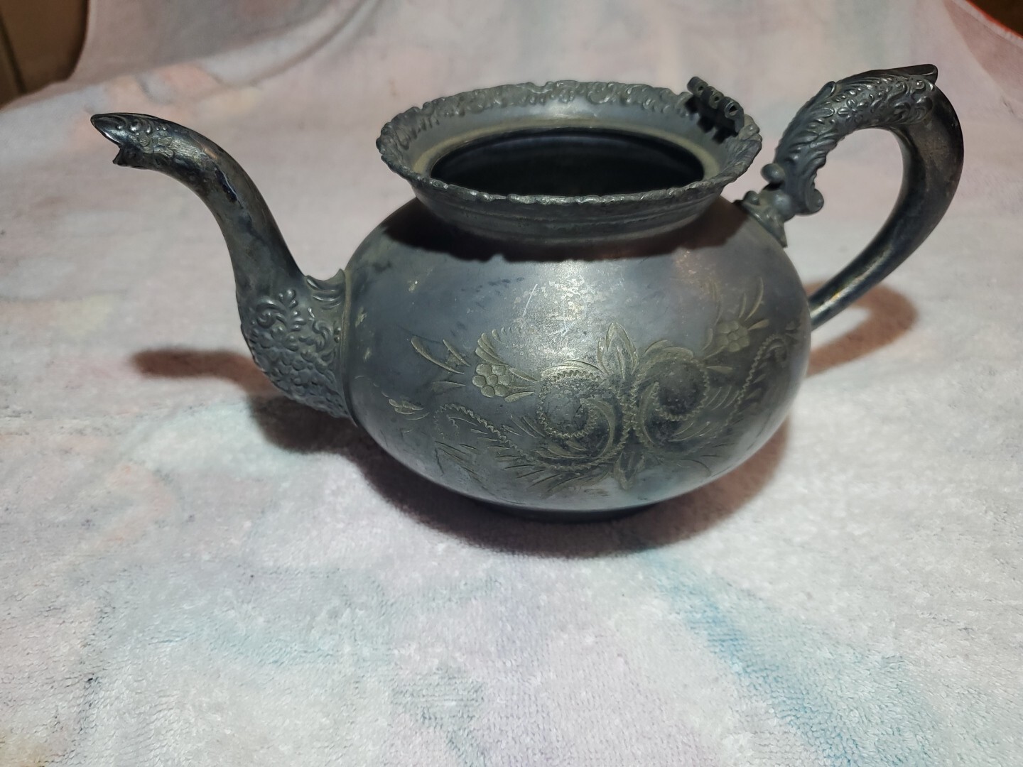 Beautifully hand-carved antique silver-plated teapot