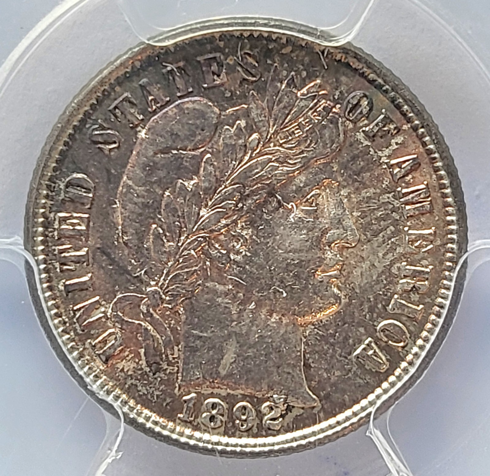1892 PCGS MS-63 Barber Dime-colorful toning on obverse. #185