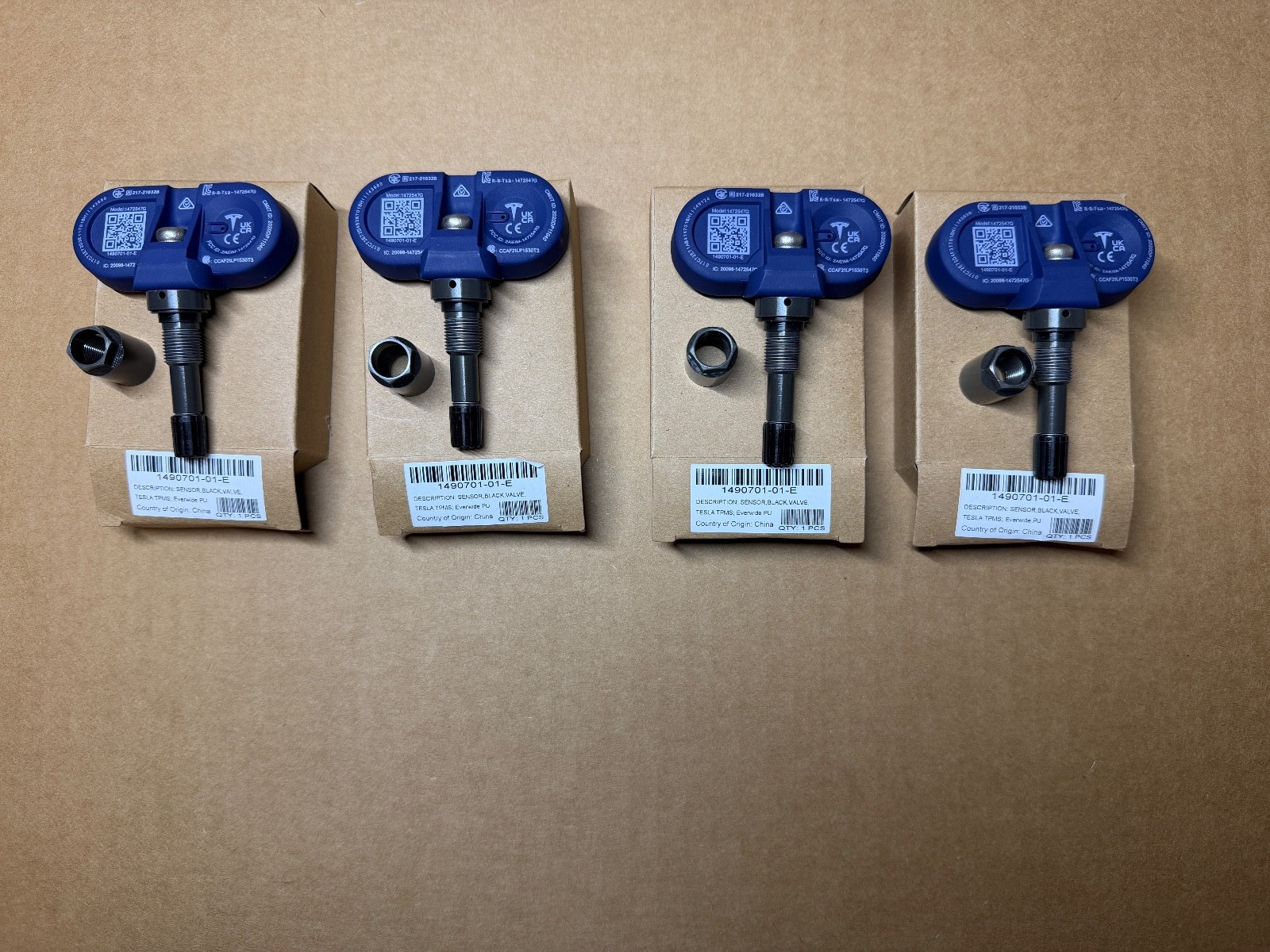 Set of 4 NEW OEM Tesla Model 3 S X Y Bluetooth TPMS Sensor with Nut 1490701-01-E
