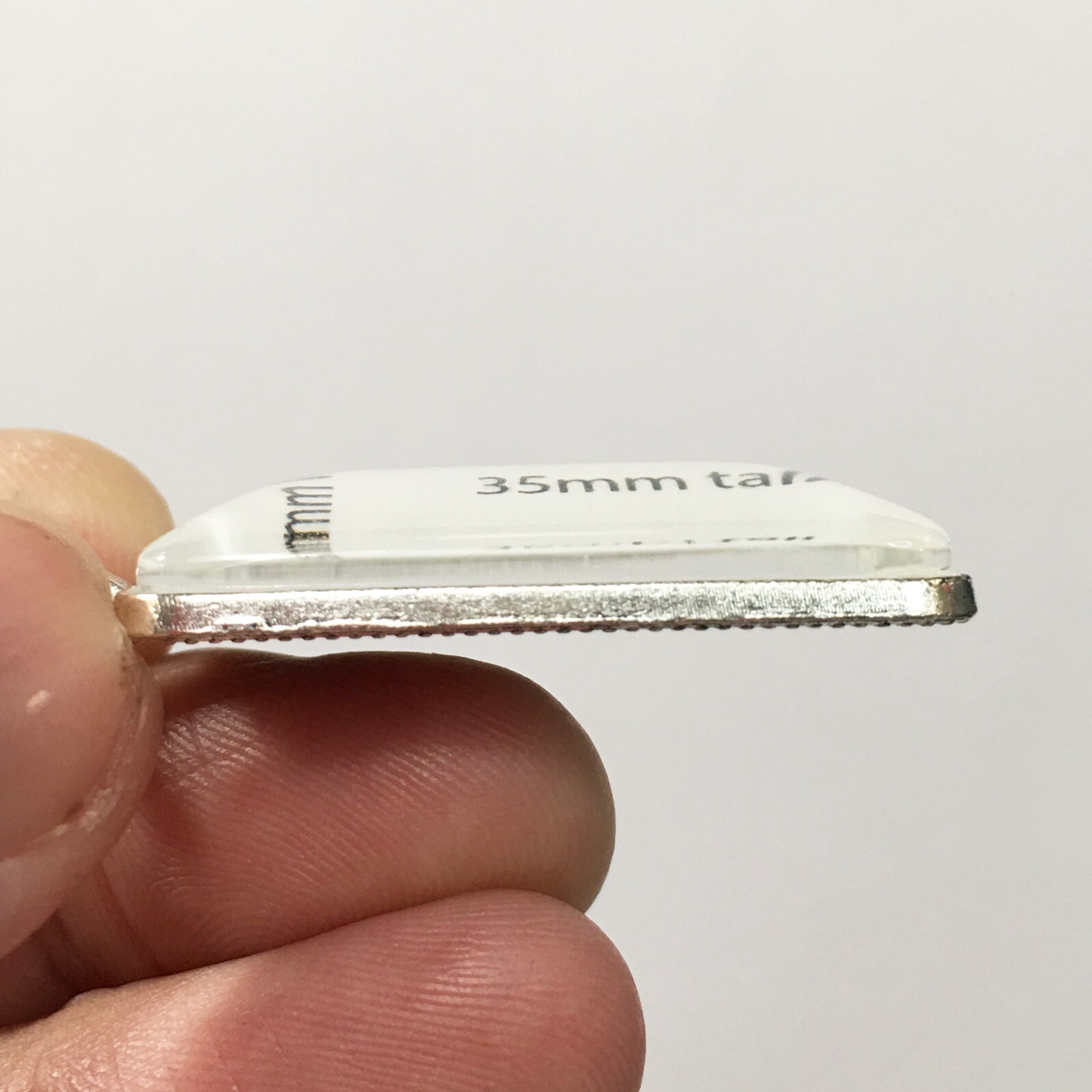 Vintage 1950's CHROME colored Cadillac Badge Trunk Emblem Rectangle Keychain