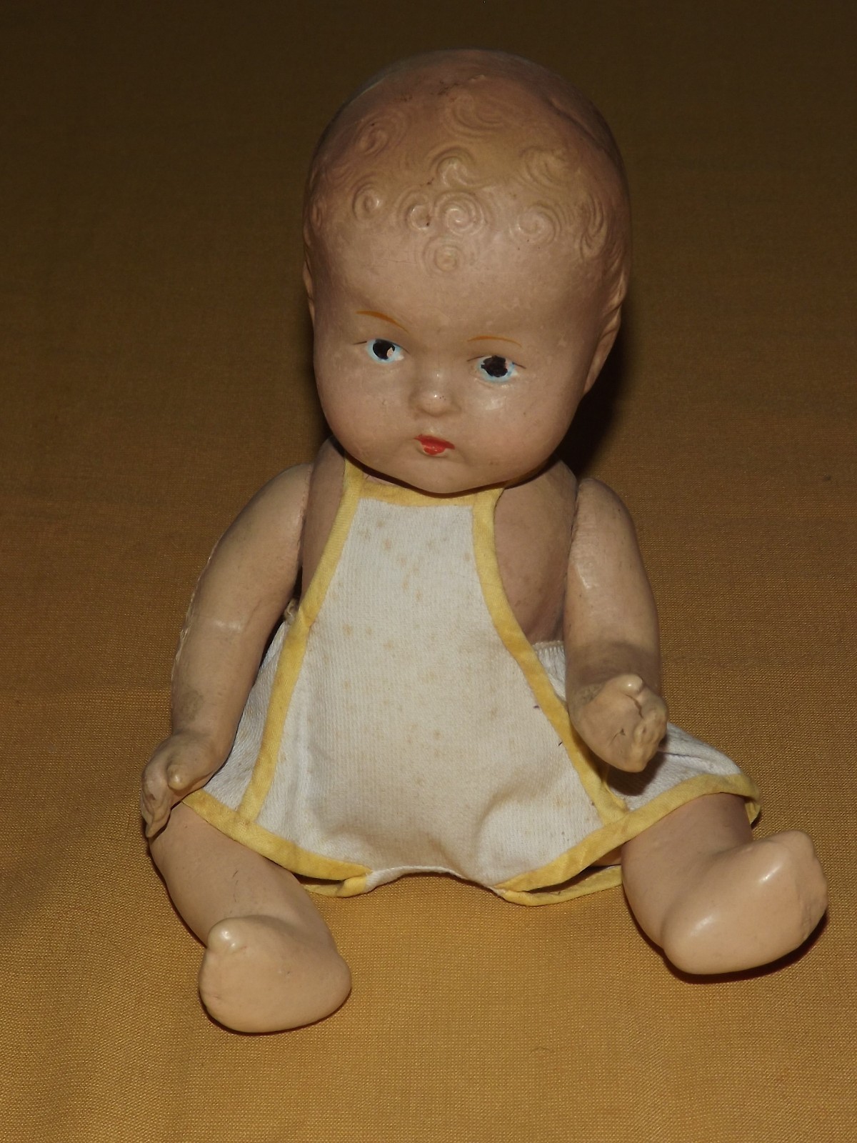 VINTAGE TOY 9" HIGH COMPOSITE BABY DOLL IN SUNSUIT