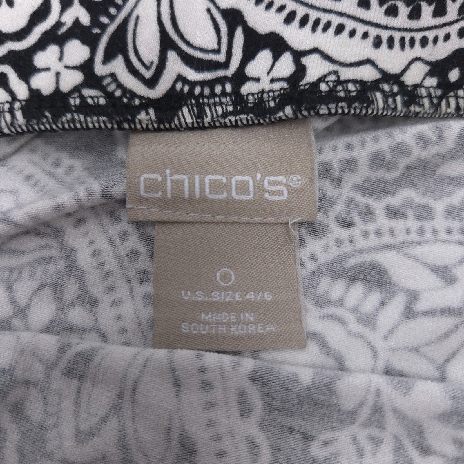 Chico's stretch knit midi skirt Size 0 (S) paisley black/white shark hem pull-on