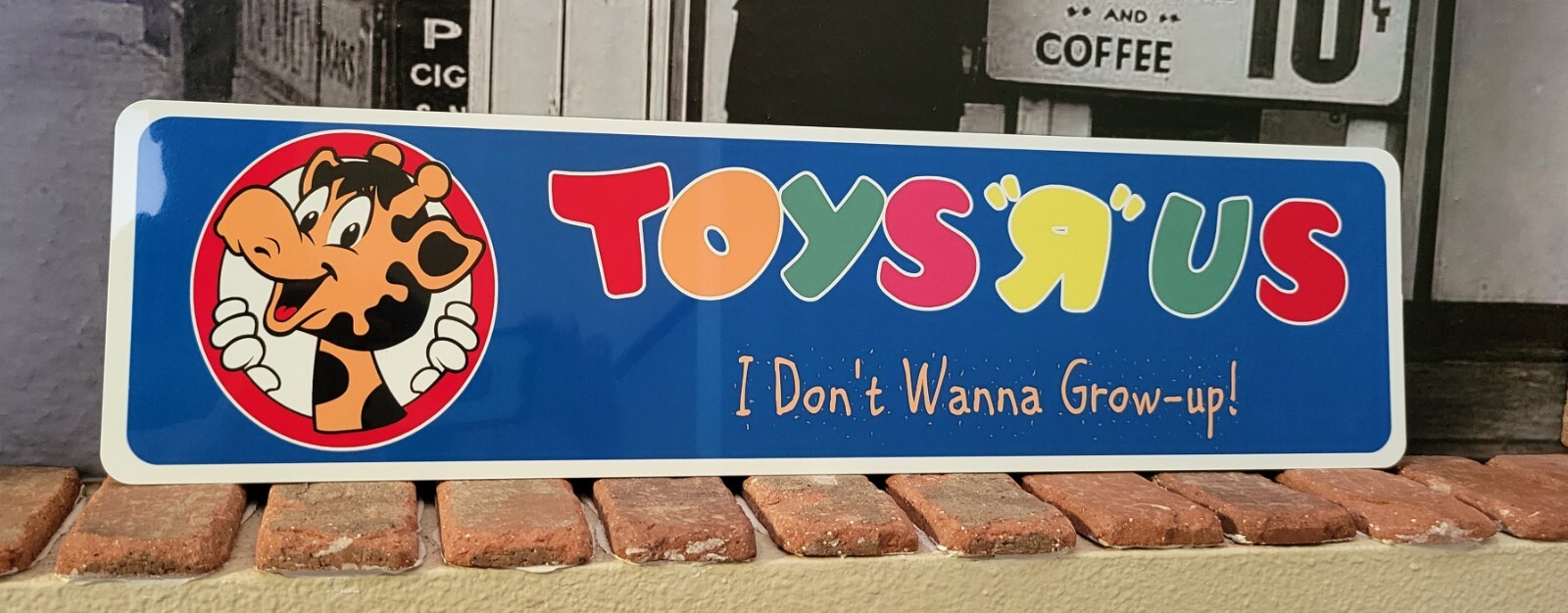 Toys R Us aluminum sign 6" x 23" I Don't Wanna Grow-Up!