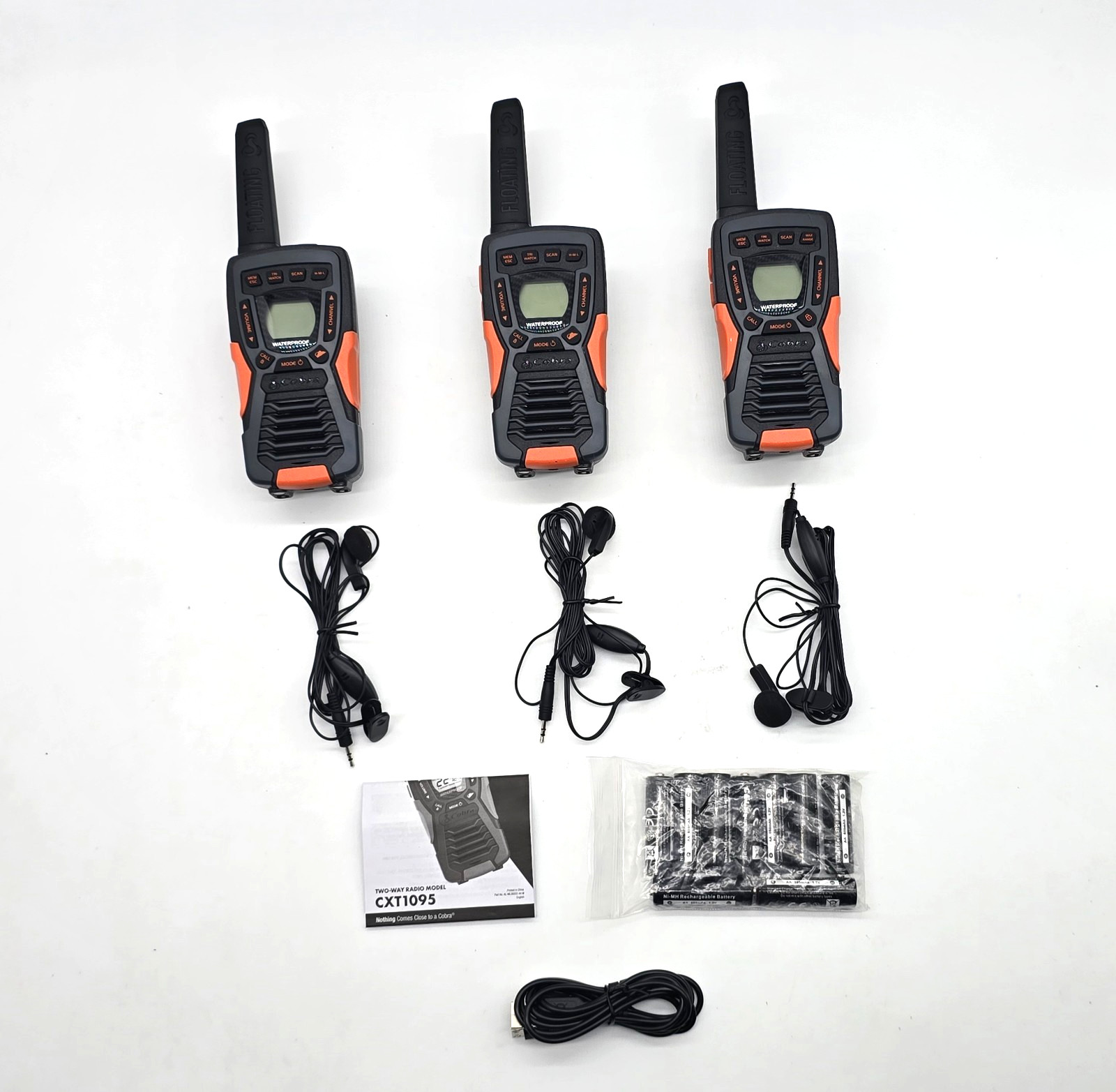Gently used Cobra CXT1095-3PH Two-Way Waterproof Radios W/ 3 New Earbuds
