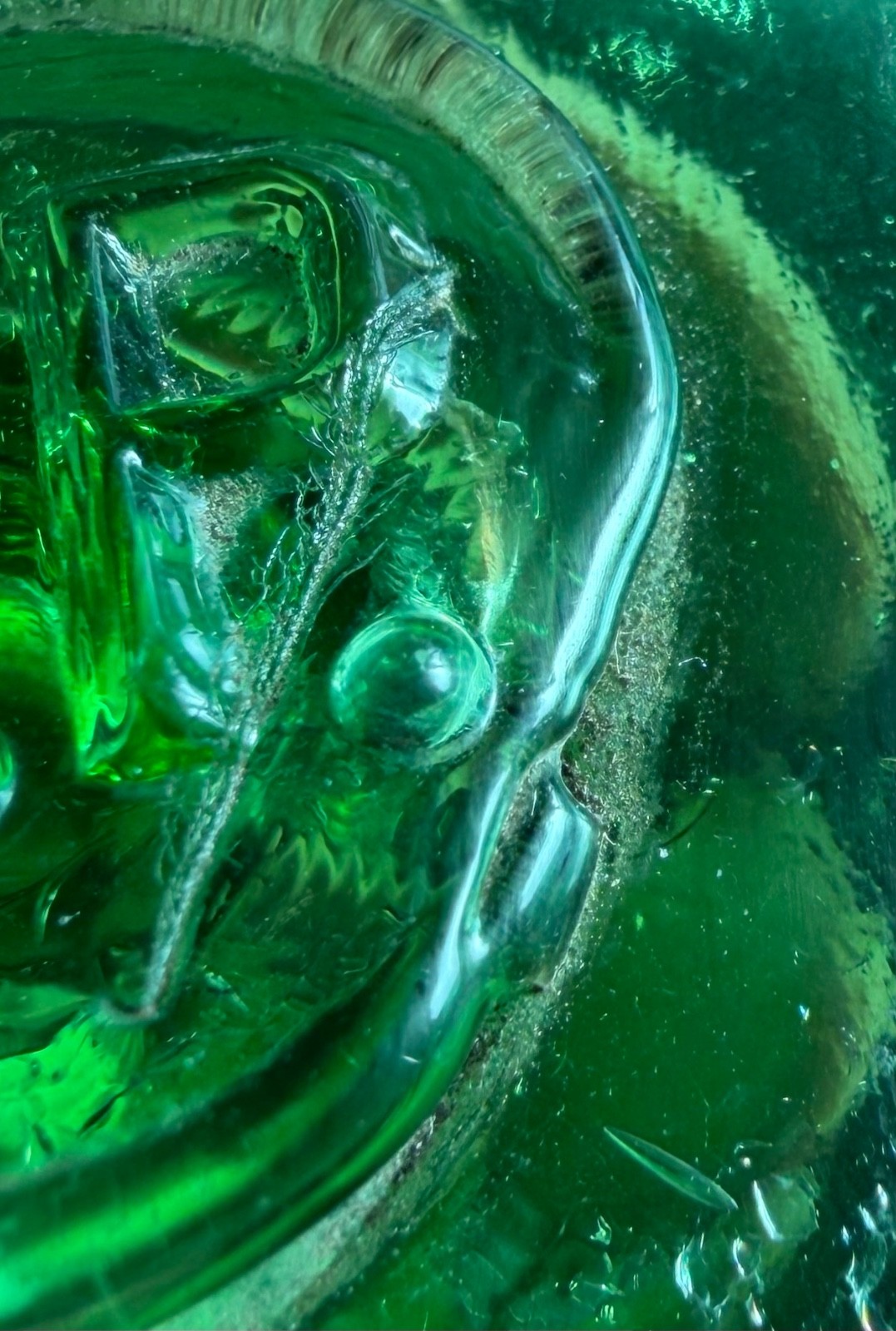 Glass fishing float marked G.P.