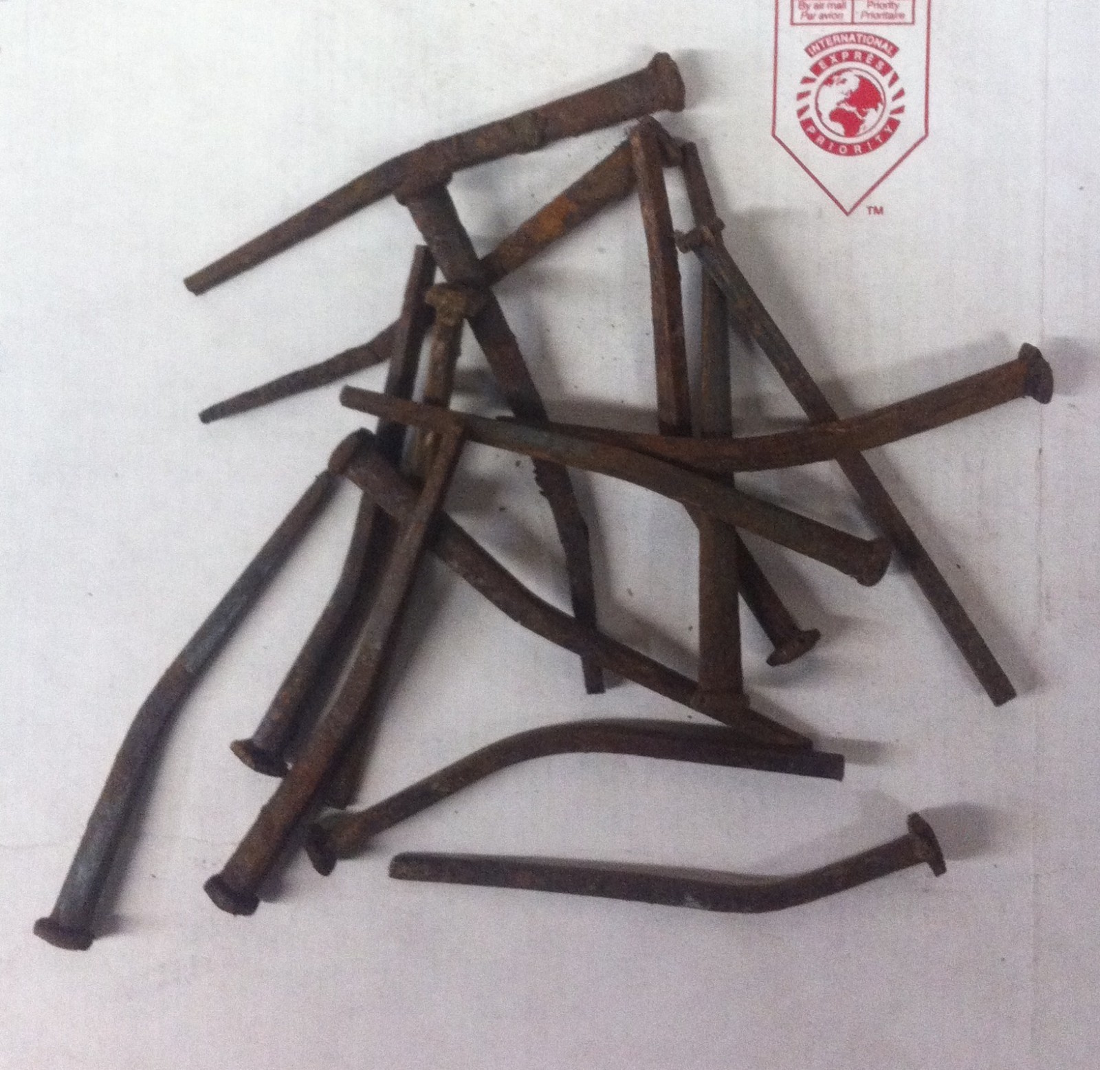 300 (15LB'S) ANTIQUE BENT SQUARE 4.5" LONG NAILS (bent pieces)