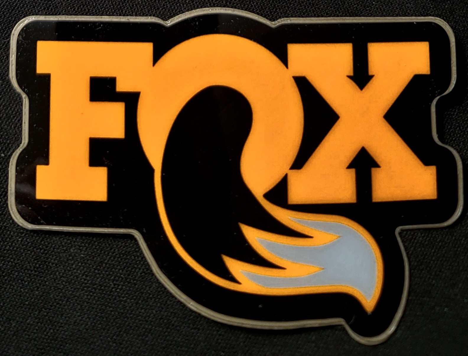 RACING STICKER BLACK AND ORANGE FOX 3 1/2 X 2 3/8" GLOSSY THICK WATERPROOF USE
