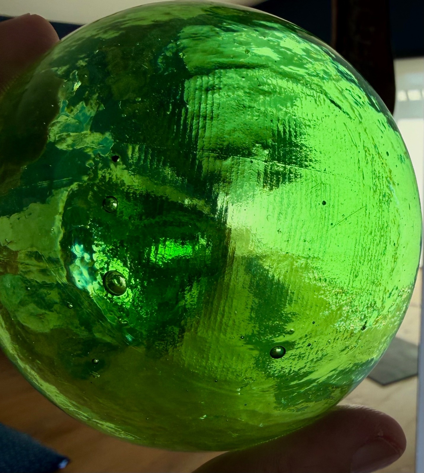 Glass fishing float marked G.P.