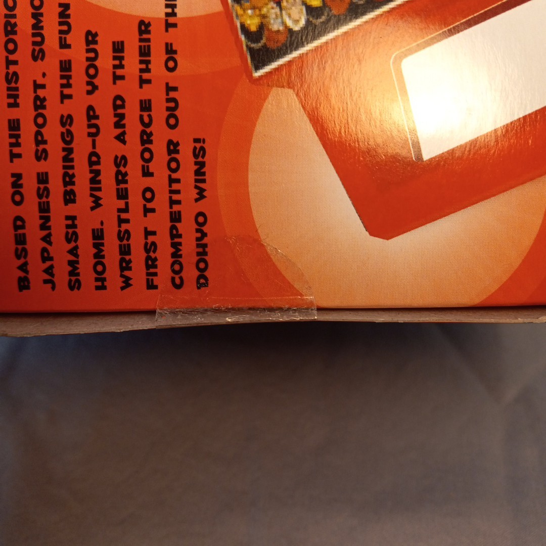 Tomy Classics Sumo Smash Wind Up Travel Game 2009 Bazoo Global New W Box Damage