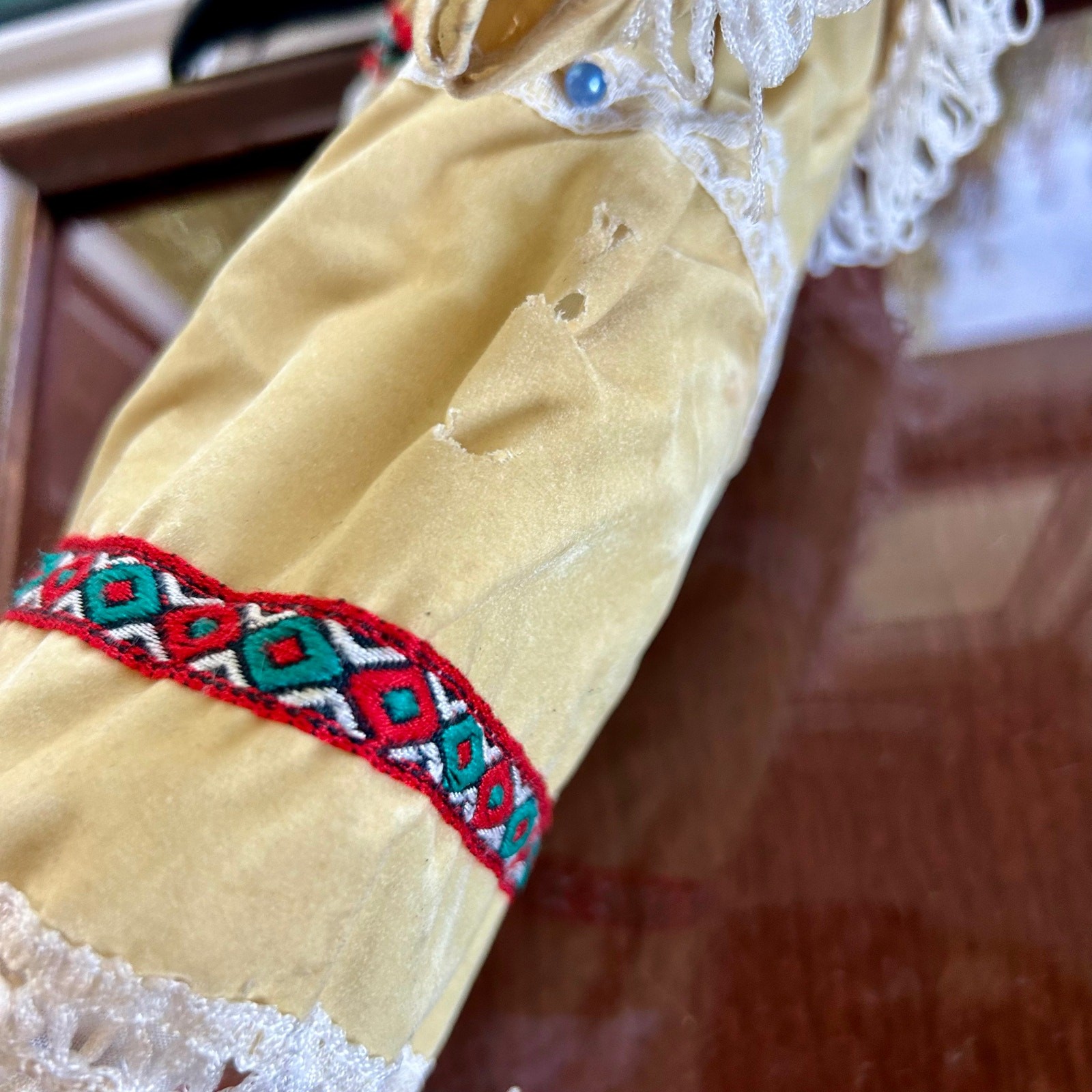 Vintage Porcelain Native American-Inspired Doll with Braids and Beaded Outfit