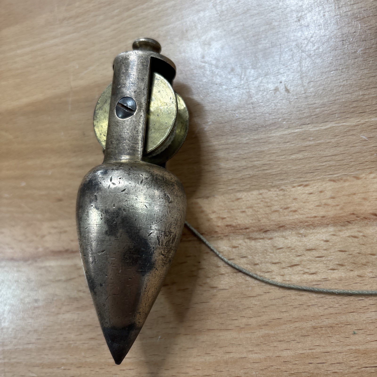 Vintage early Brass Plumb bob W / Integrated Reel Cord (Stanley?)