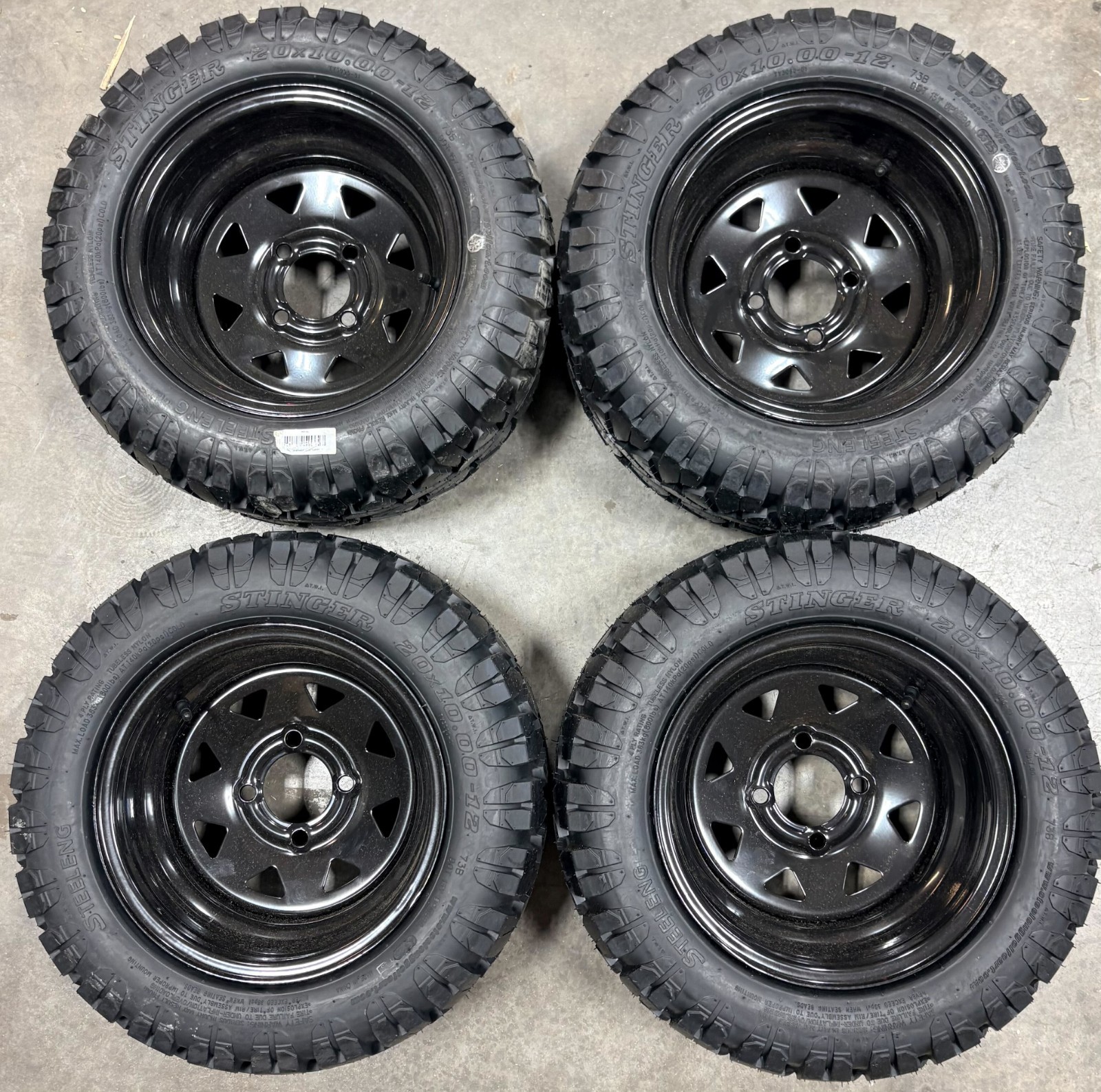 12" Black Steel Wheel & 20x10-12" Stinger All Terrain DOT Tire - Set of 4 (USED)