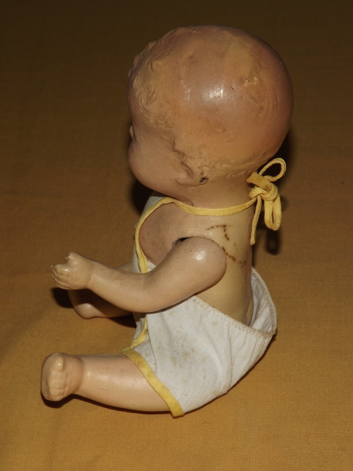 VINTAGE TOY 9" HIGH COMPOSITE BABY DOLL IN SUNSUIT