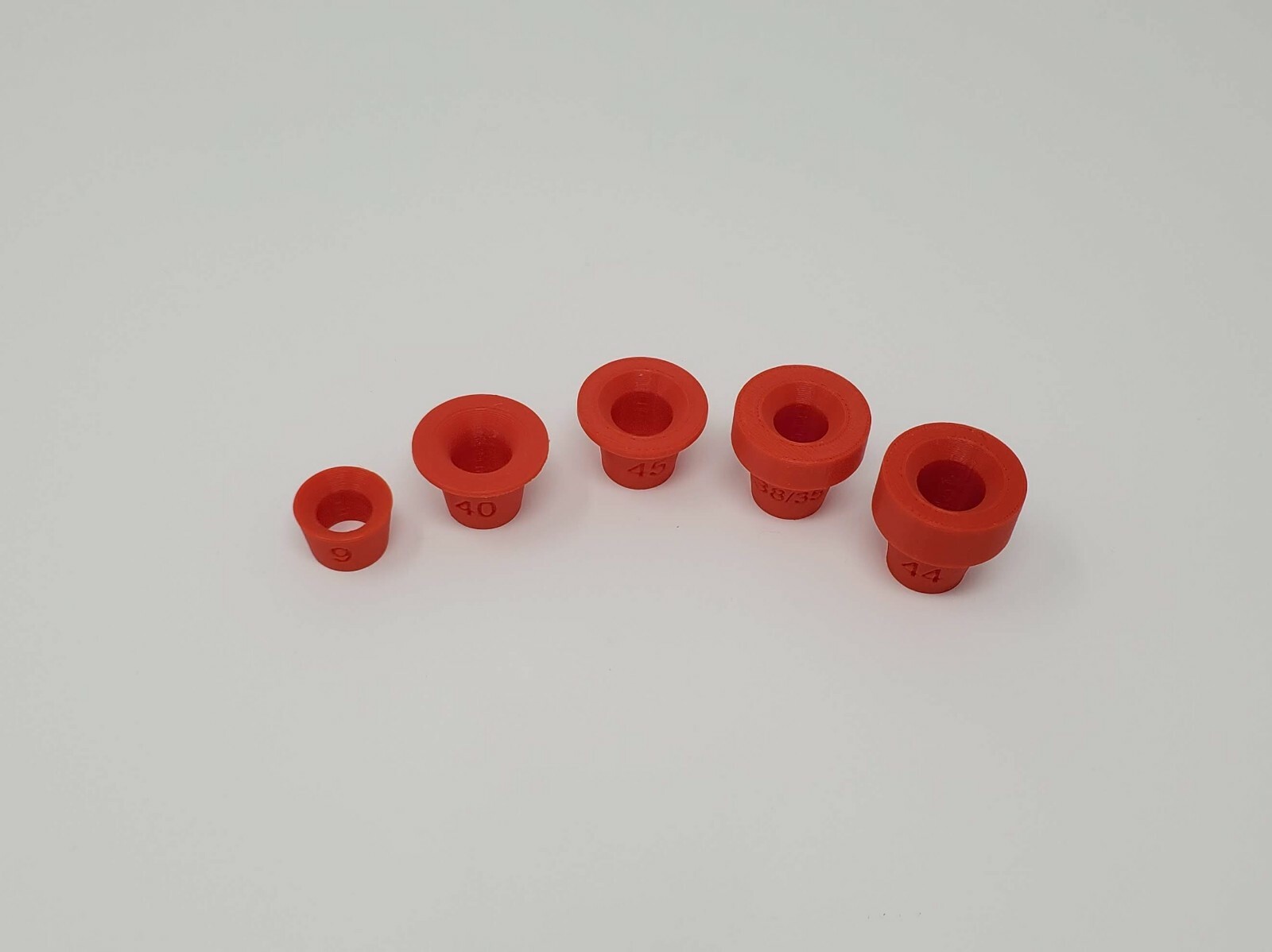 Hornady LNL Case Feeder pivot adapter bushing for top 5 Pistol Chambers