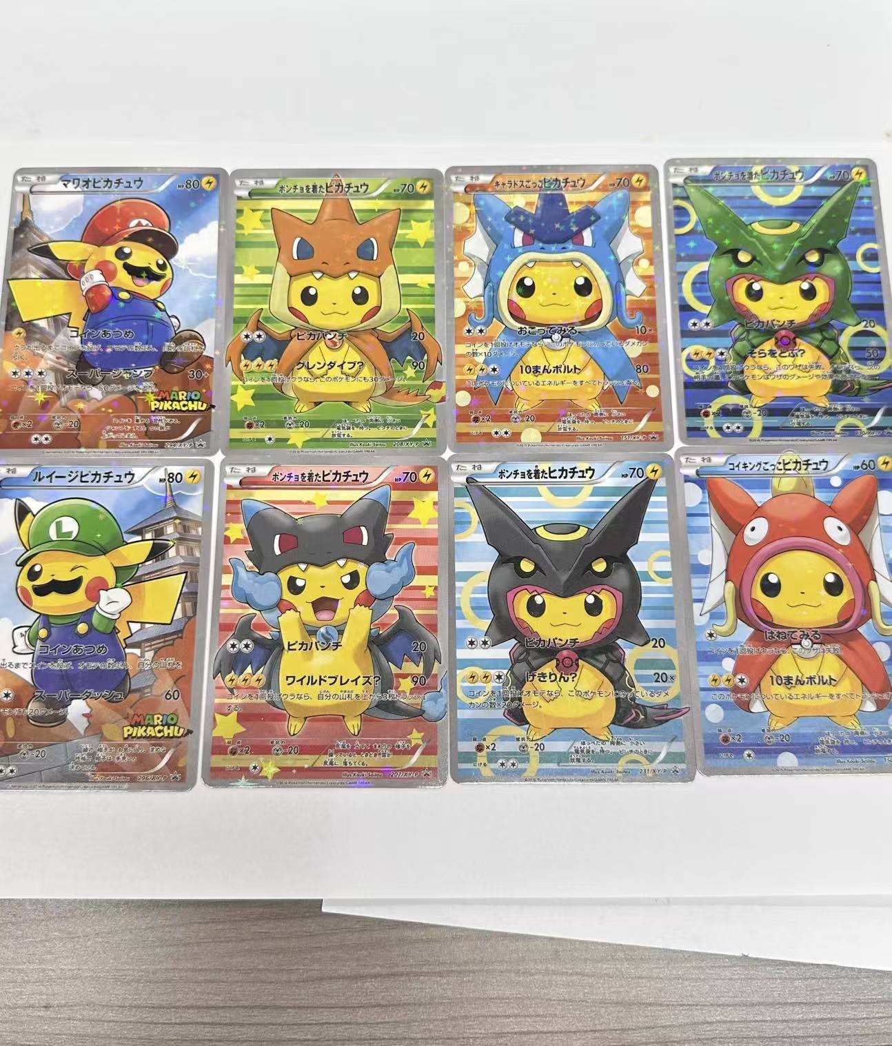 POKEMON PIKACHU PONCHO CHARIZARD MARIO LUIGI RAYQUAZA COMPLETE SET 8 Card