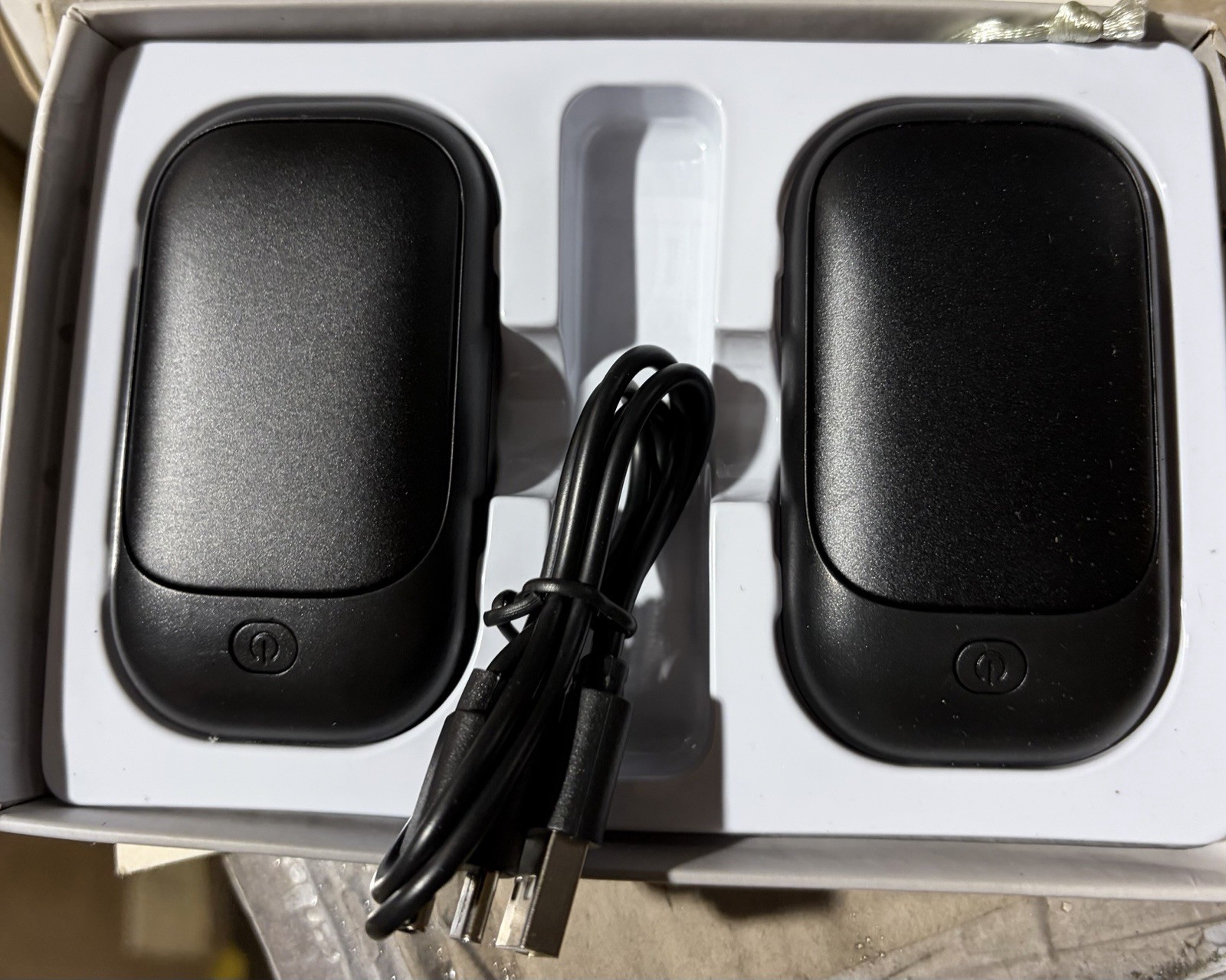 Two rechargeable magnetic hand warmers, heating time 12 hours