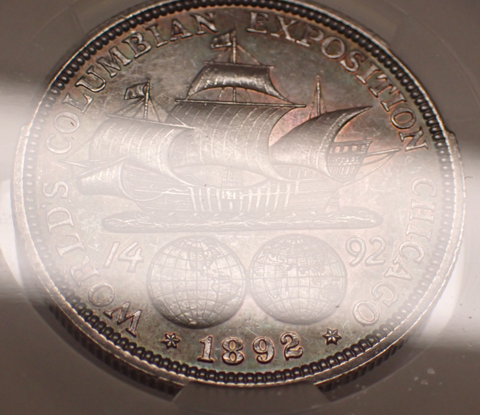 1892 Columbian Expo 50c CAC MS62 Deep Toning w/obv Iridescent Edge Toning