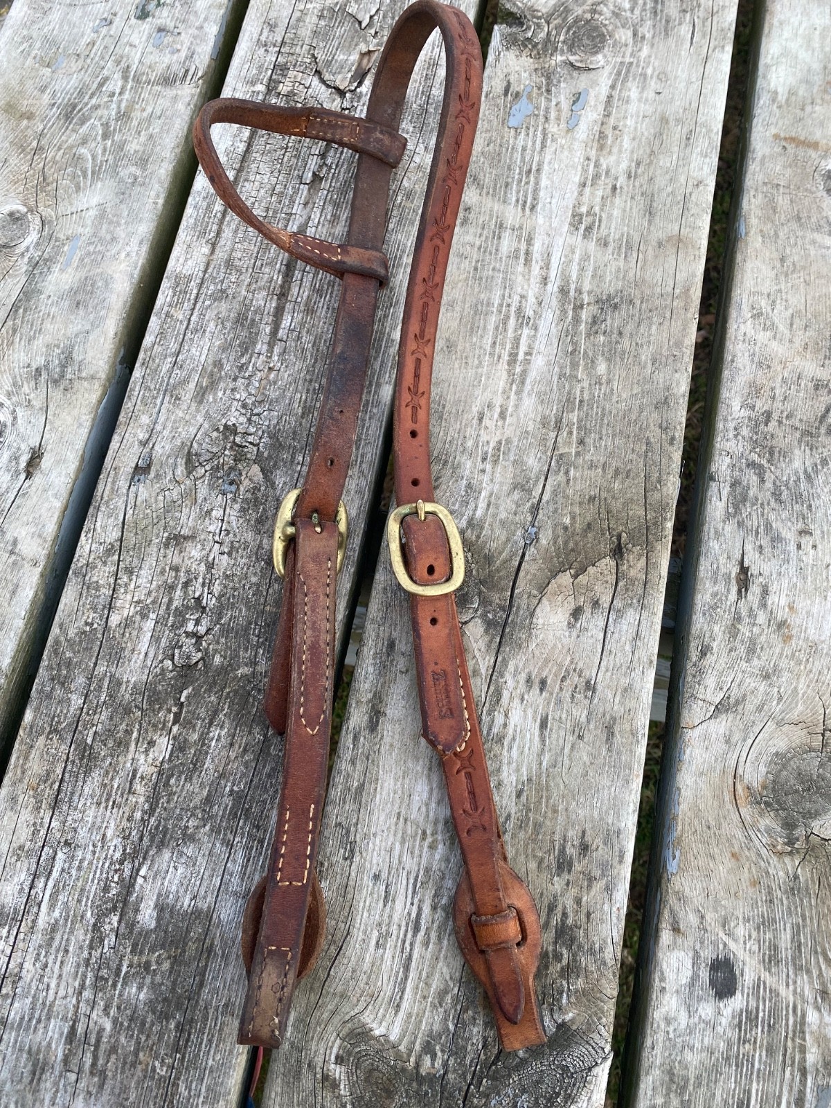 Used Schutz Bros barb wire tooled one ear western headstall w/quick change ends