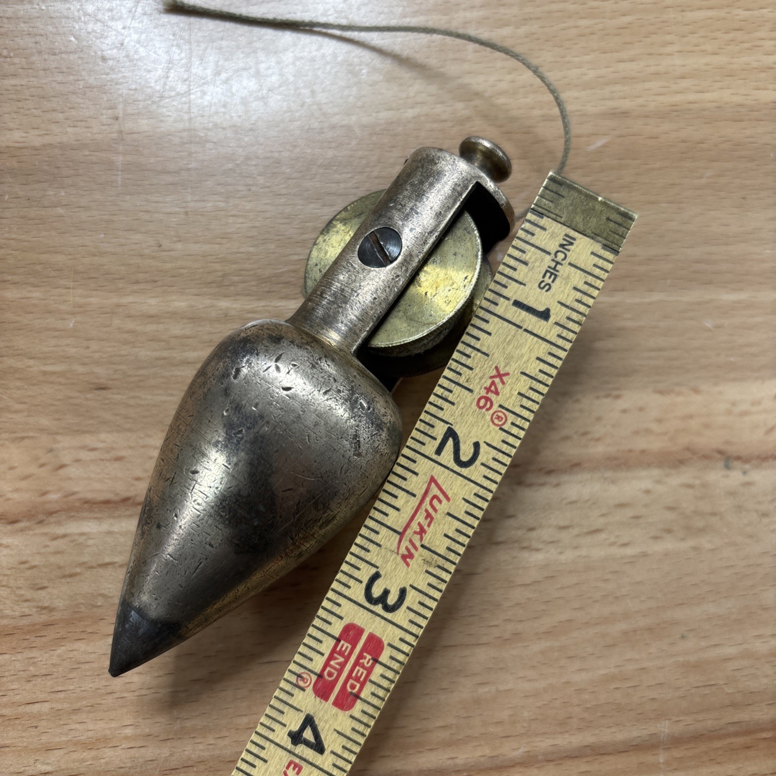 Vintage early Brass Plumb bob W / Integrated Reel Cord (Stanley?)