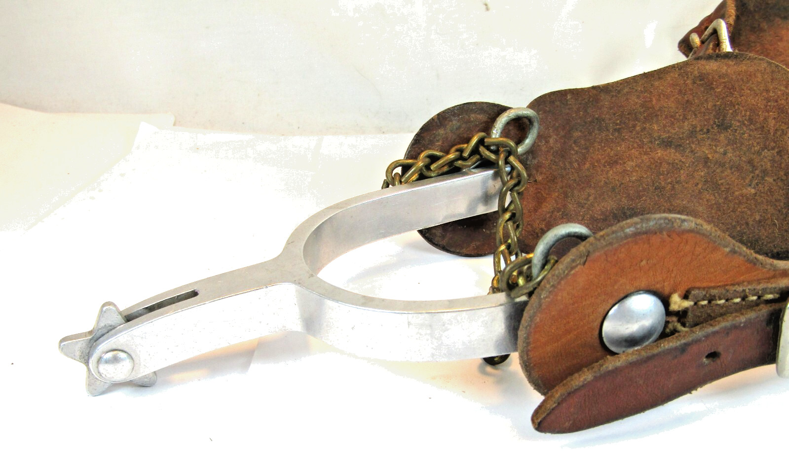 PAIR OF UNMARKED ENGRAVED ALUMINUM AIRPLANE METAL RIDING SPURS W/ STRAPS