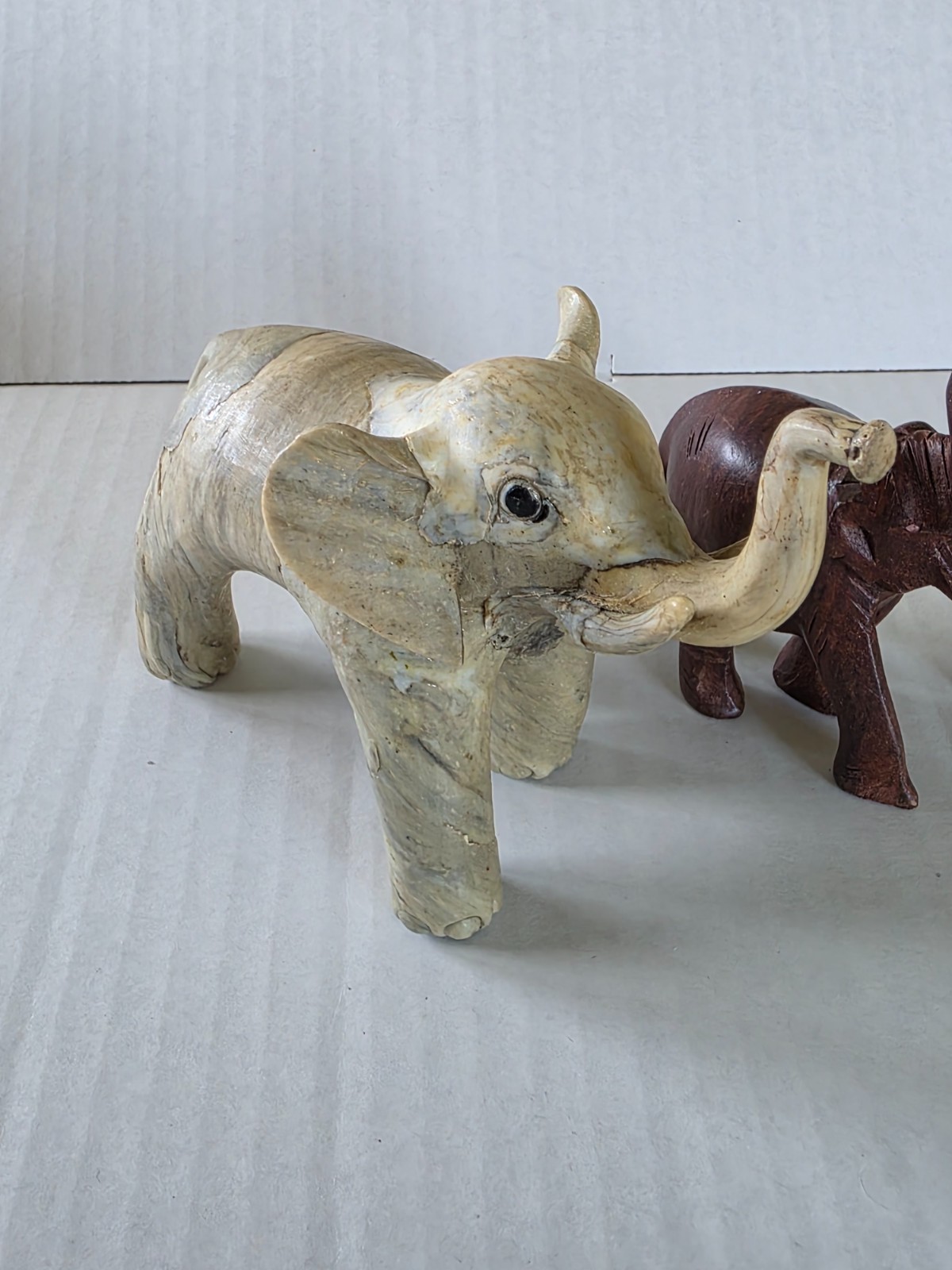 Three elephant figurines